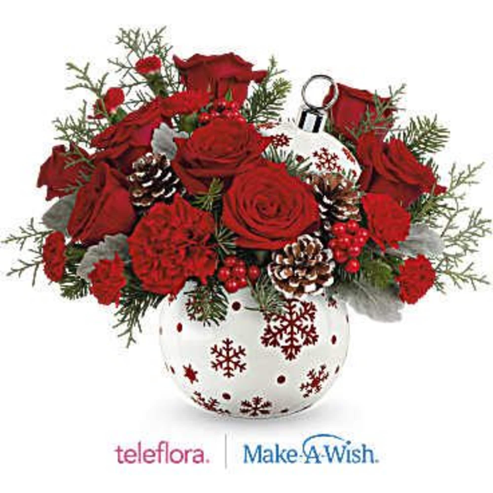 Celebrate the holidays with this festive bouquet featuring red roses, red carnations