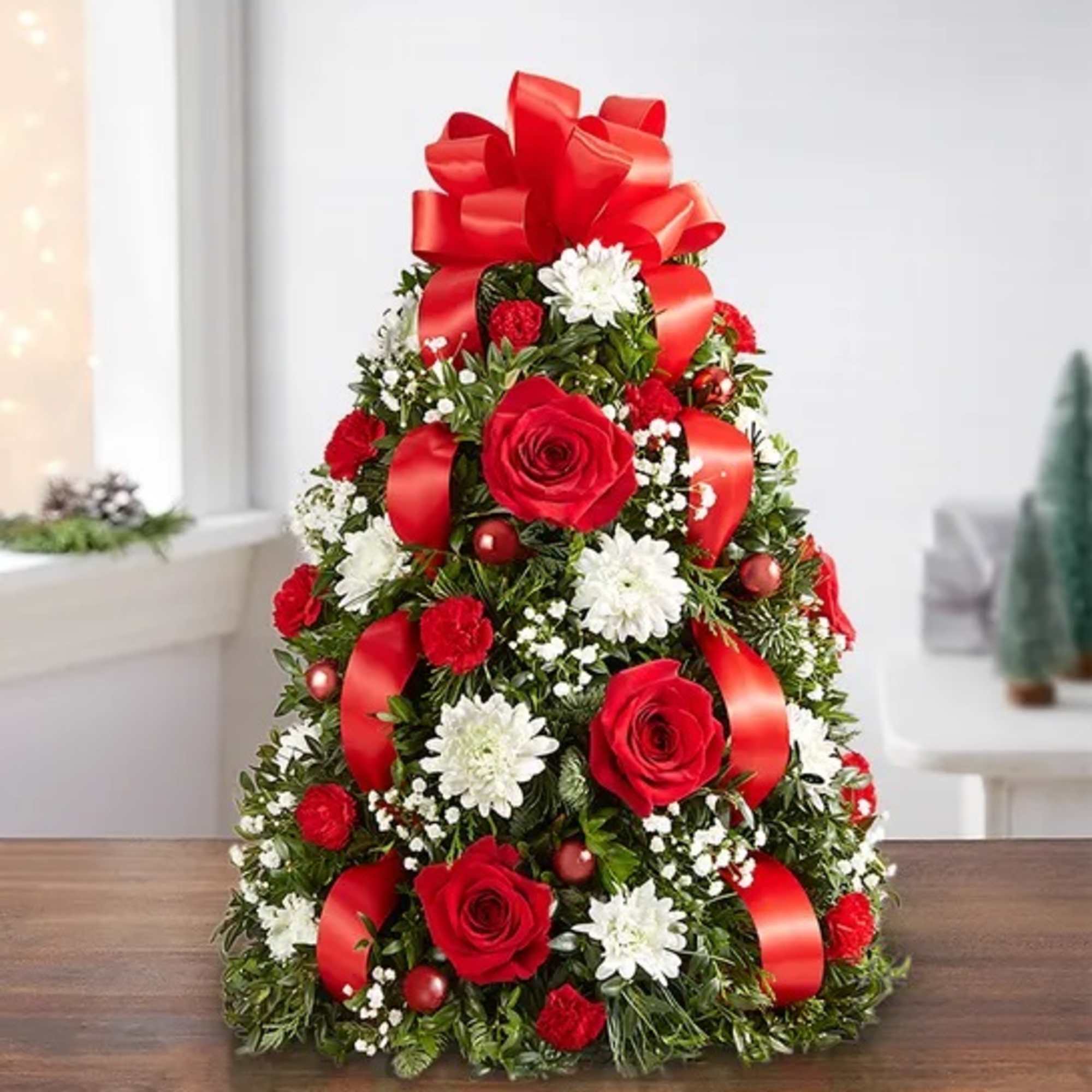 The holiday favorite that started it all! Our flower tree arrangement is