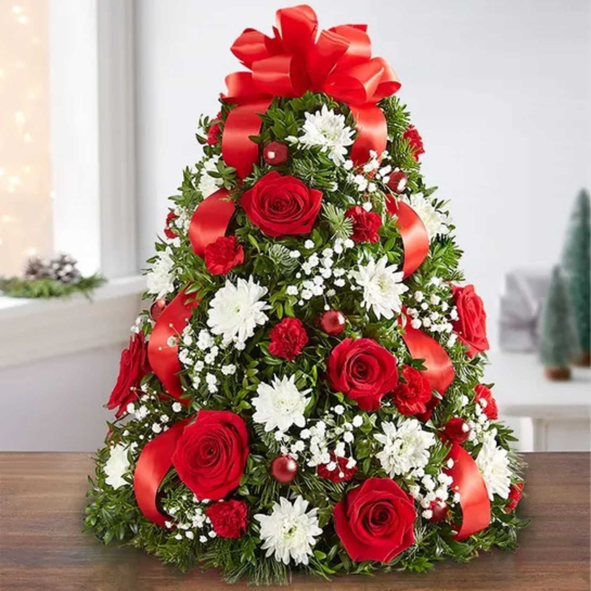 The holiday favorite that started it all! Our flower tree arrangement is