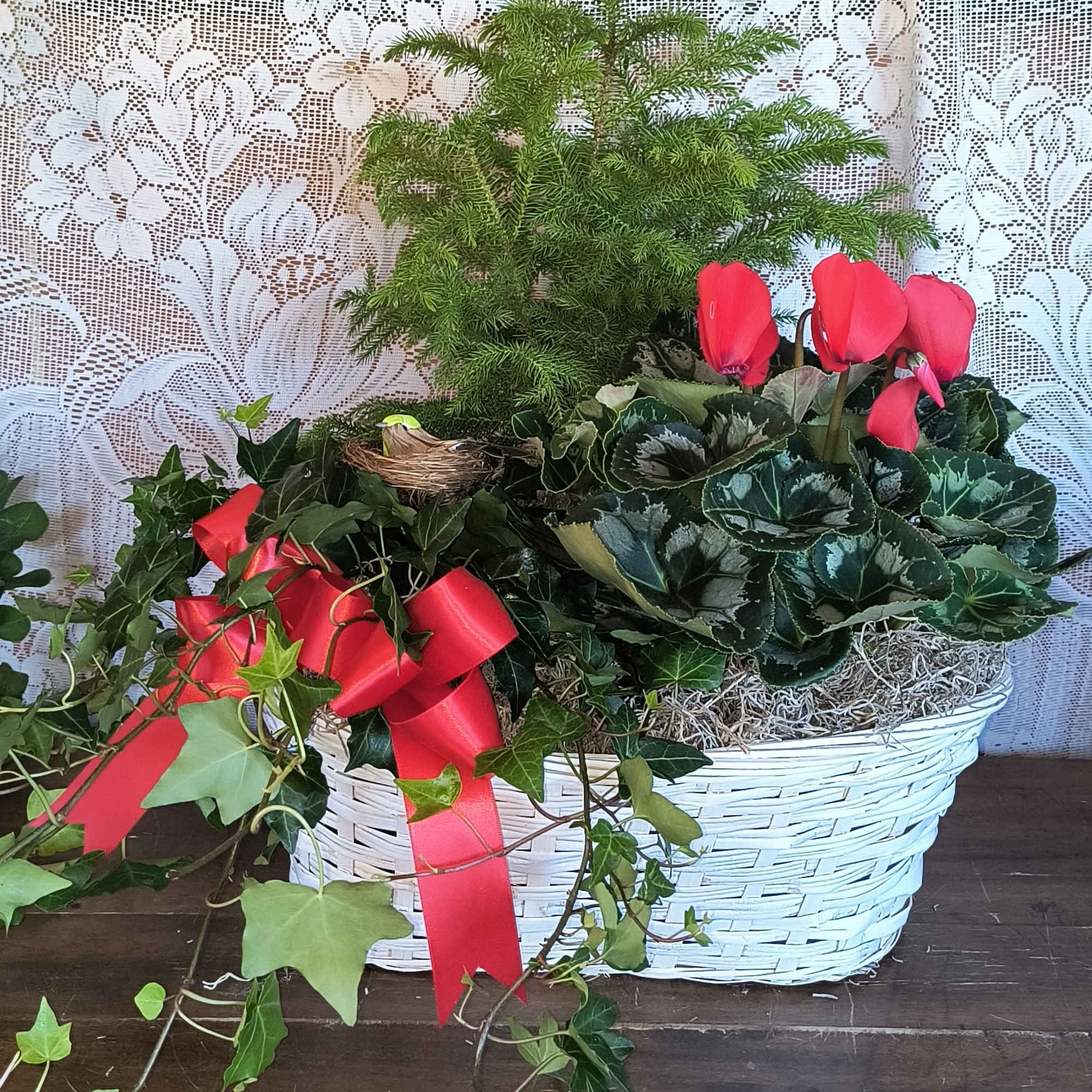 The best of both worlds, green and blooming plants in one basket