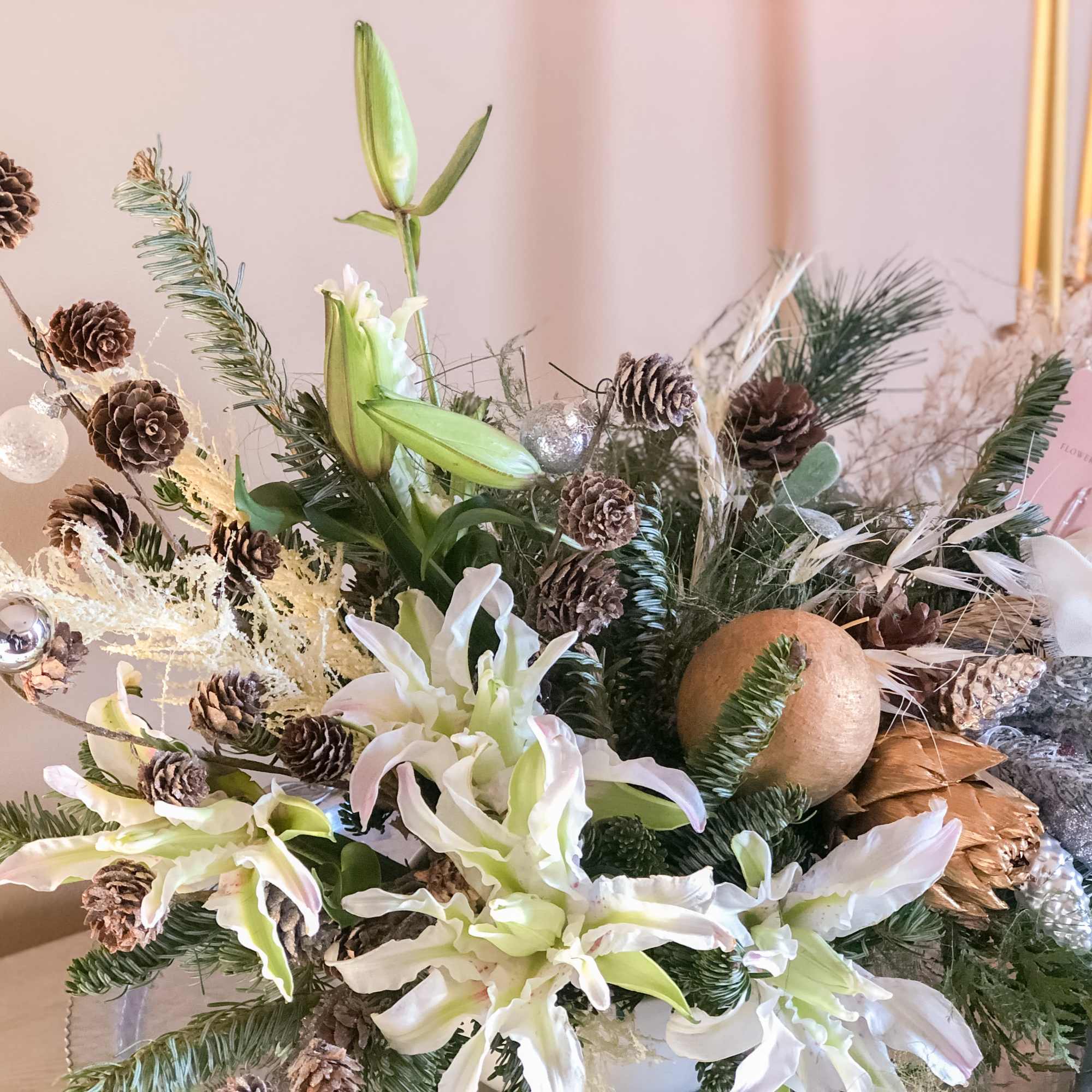 Dress up your holiday table with this fresh Christmas arrangement.  Featuring