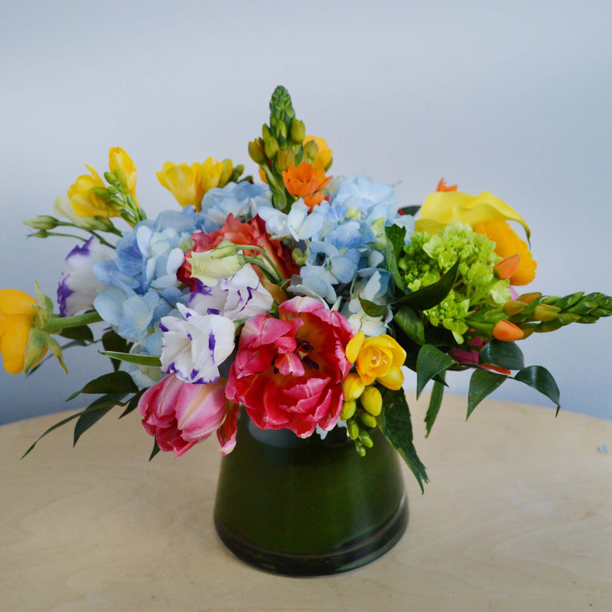 Whether for yourself or as a gift, our Warm Greetings vase arrangement