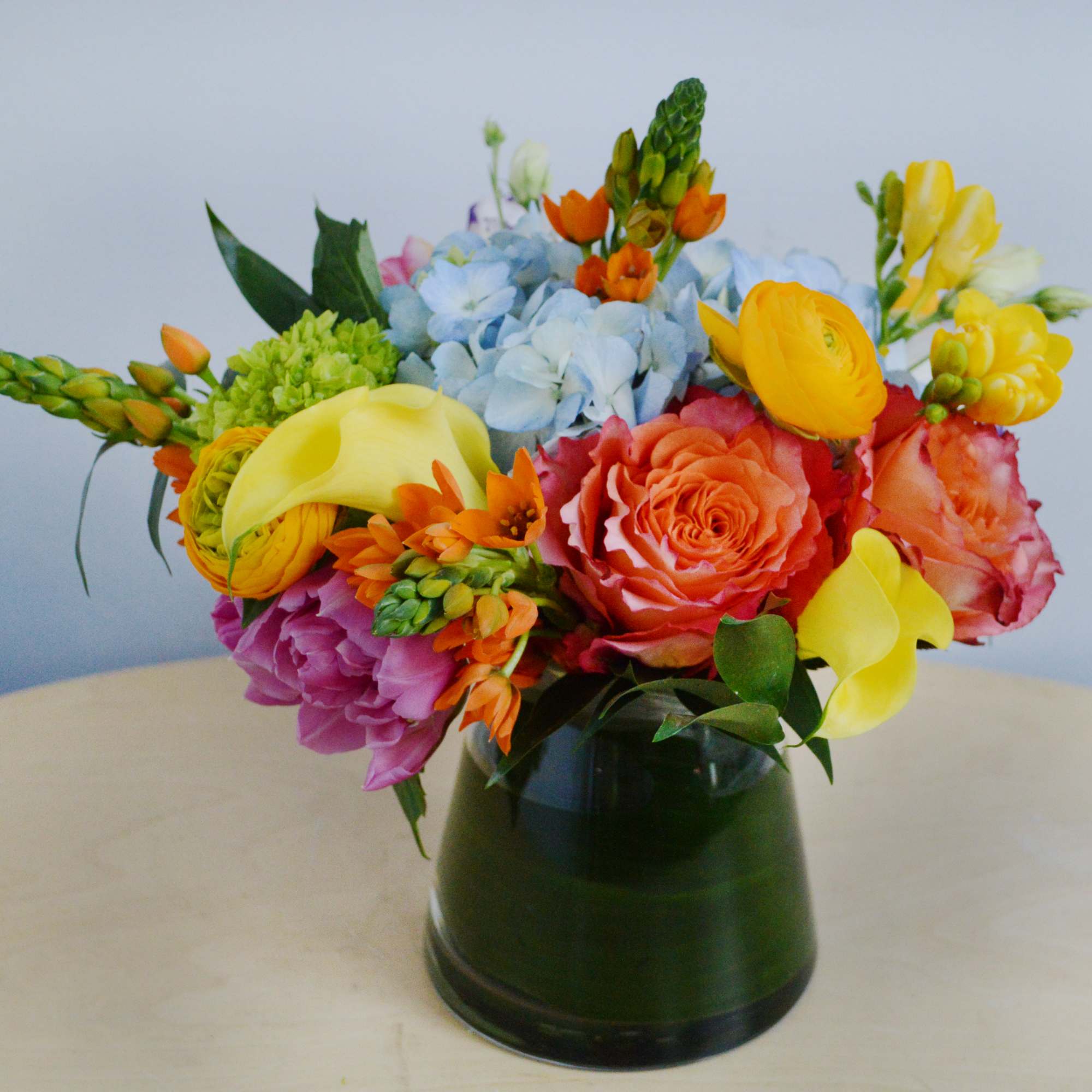 Whether for yourself or as a gift, our Warm Greetings vase arrangement