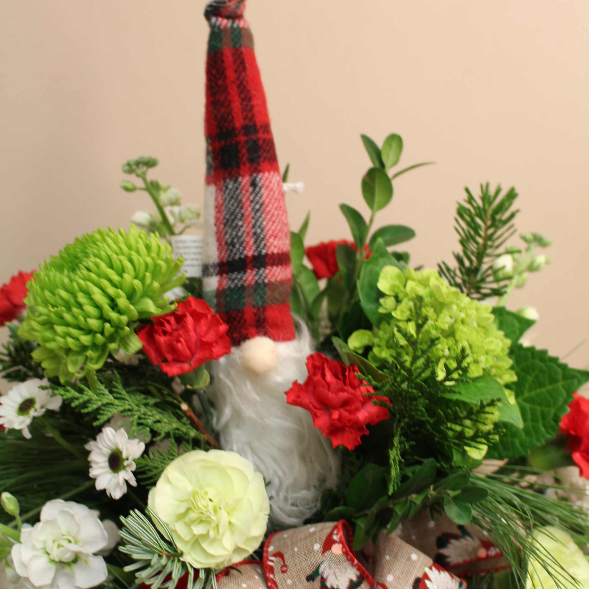 gnome themed arrangement with an ornament gnome to take out year after