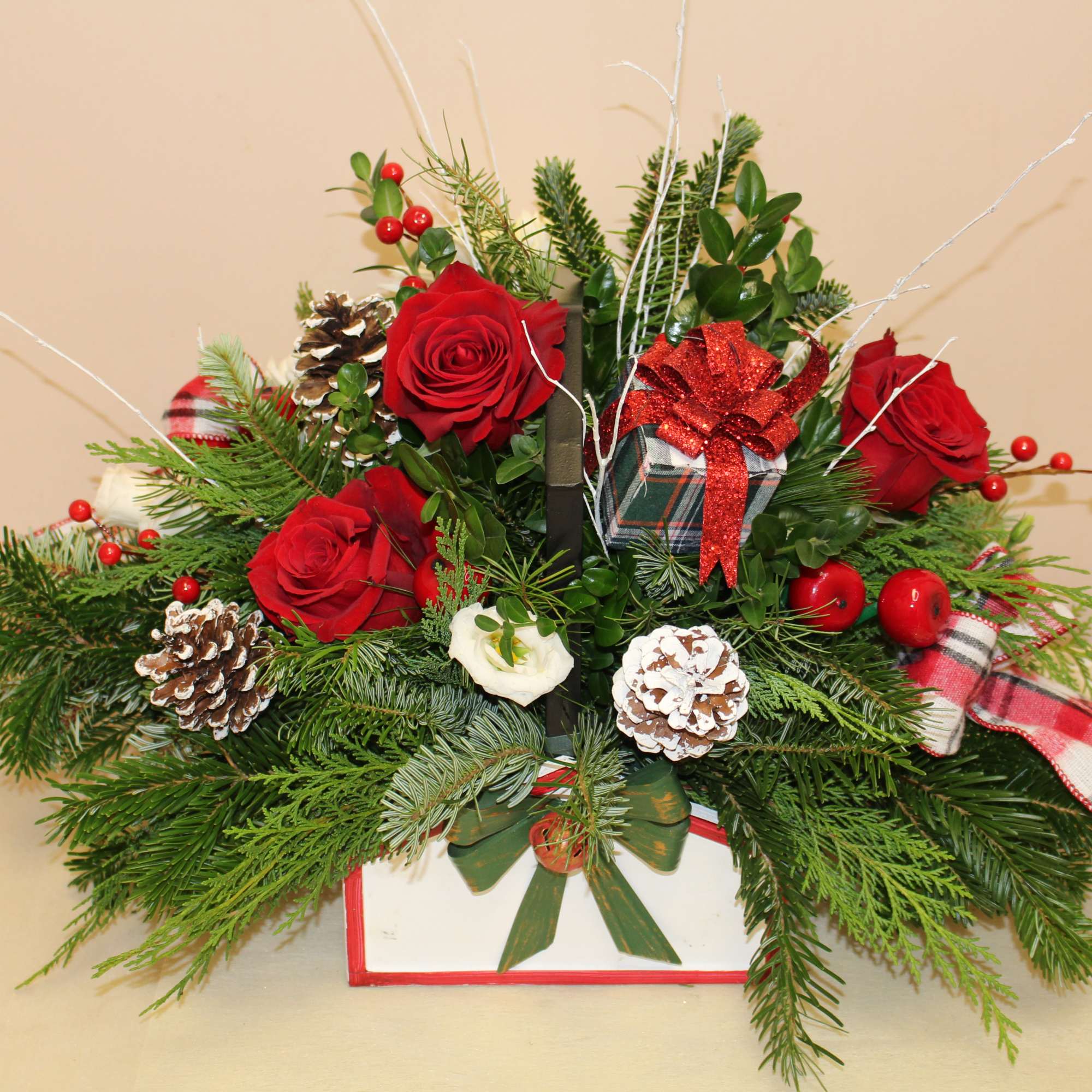 An old fashion basket with a rod iron handle is filled with