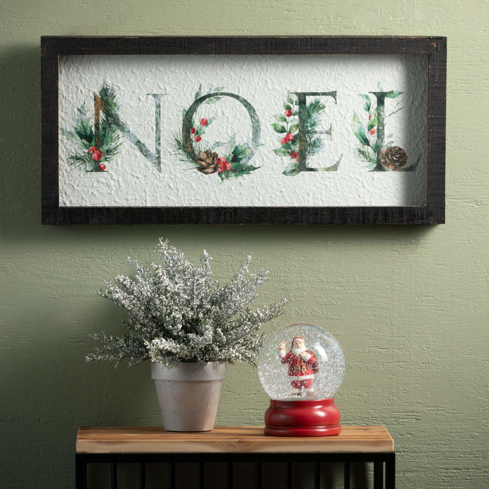 Add a warm spirit of Christmas to your space. Featuring the word