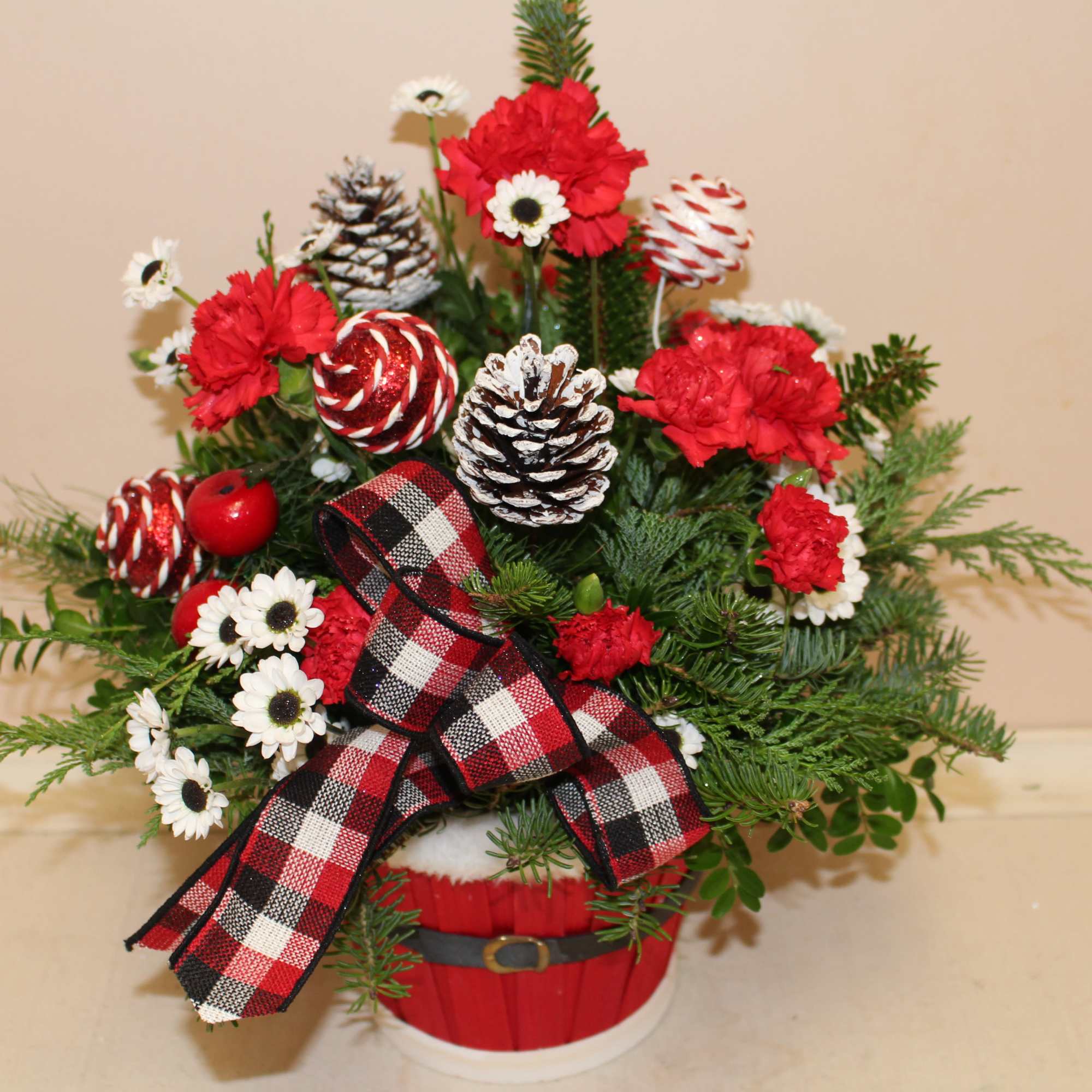 an adorable basket that looks like Santa's belly, filled with a beautiful