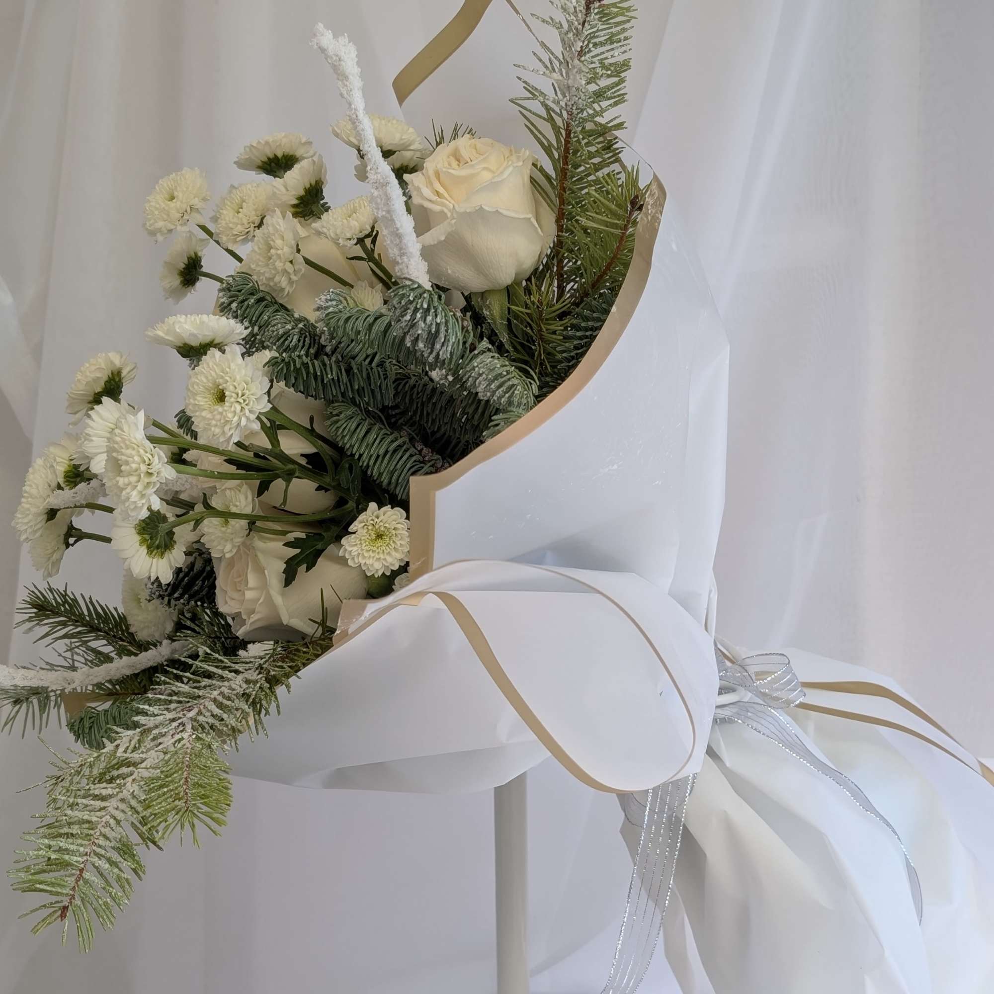 Get cozy with seasonal greens and whites beautifully hand wrapped. The scent