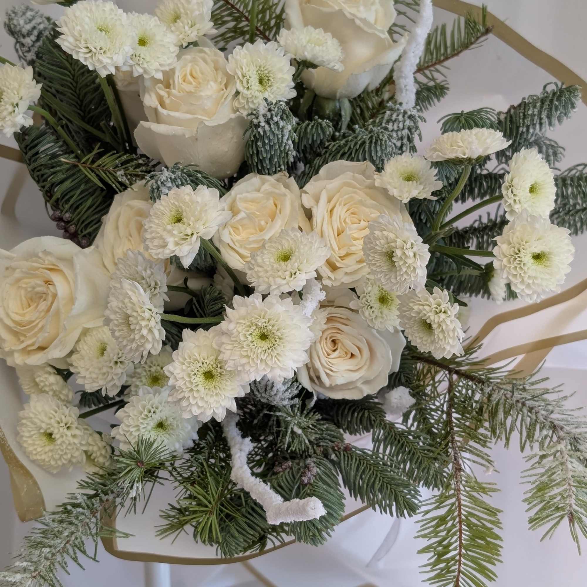 Get cozy with seasonal greens and whites beautifully hand wrapped. The scent