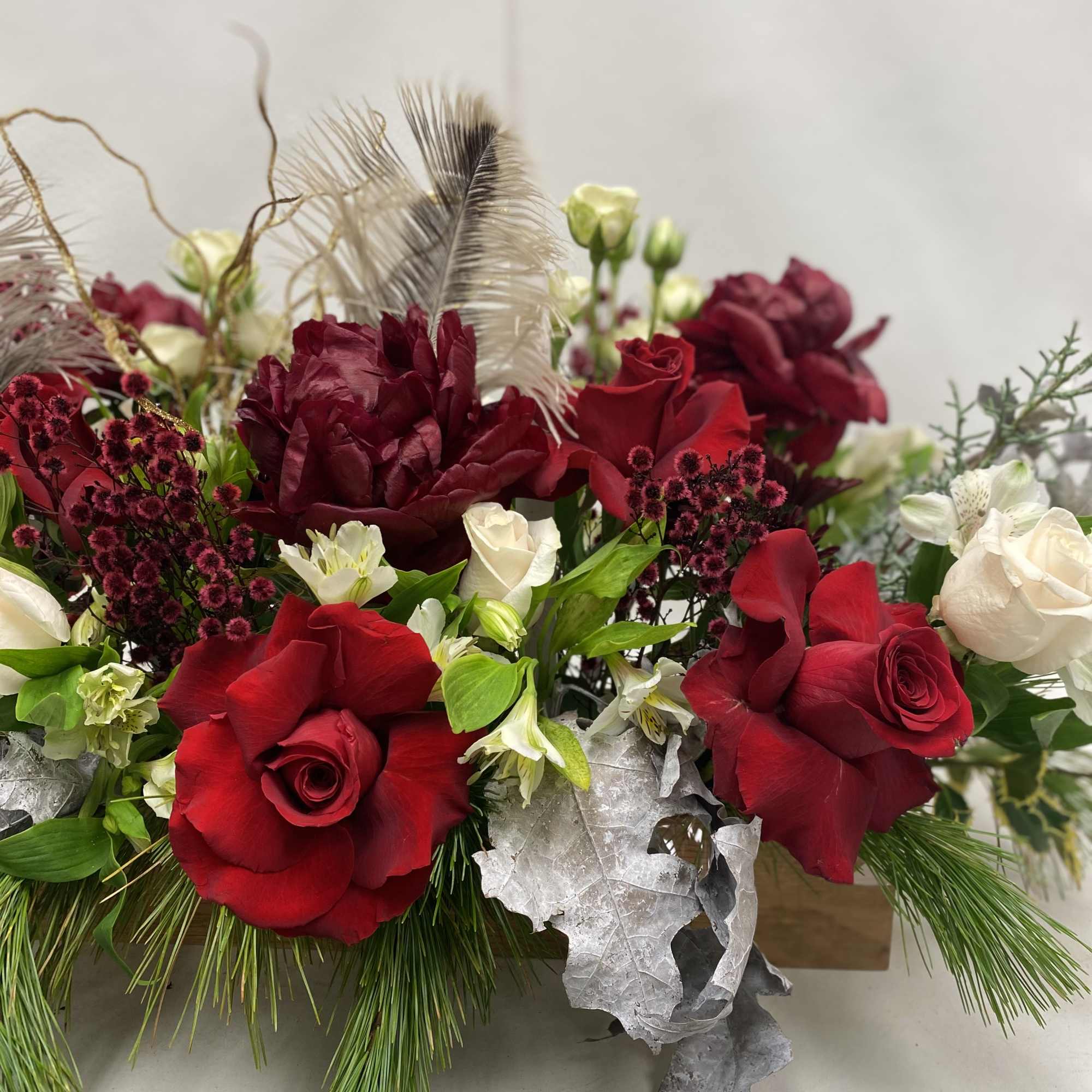 Long 24&rdquo; wooden box with peonies, roses, spray roses, alstroemerias etc. holiday