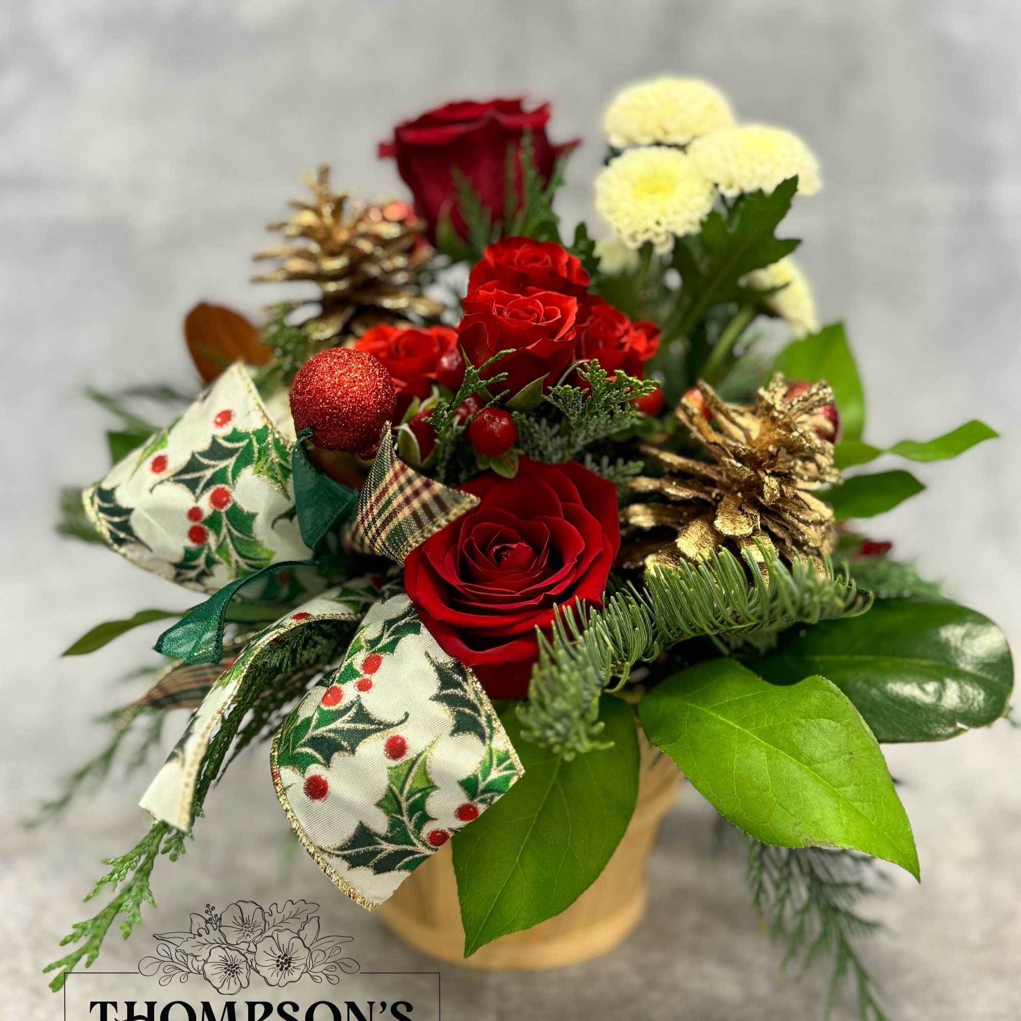 Celebrate the season with Tidings, a cheerful holiday basket filled with festive