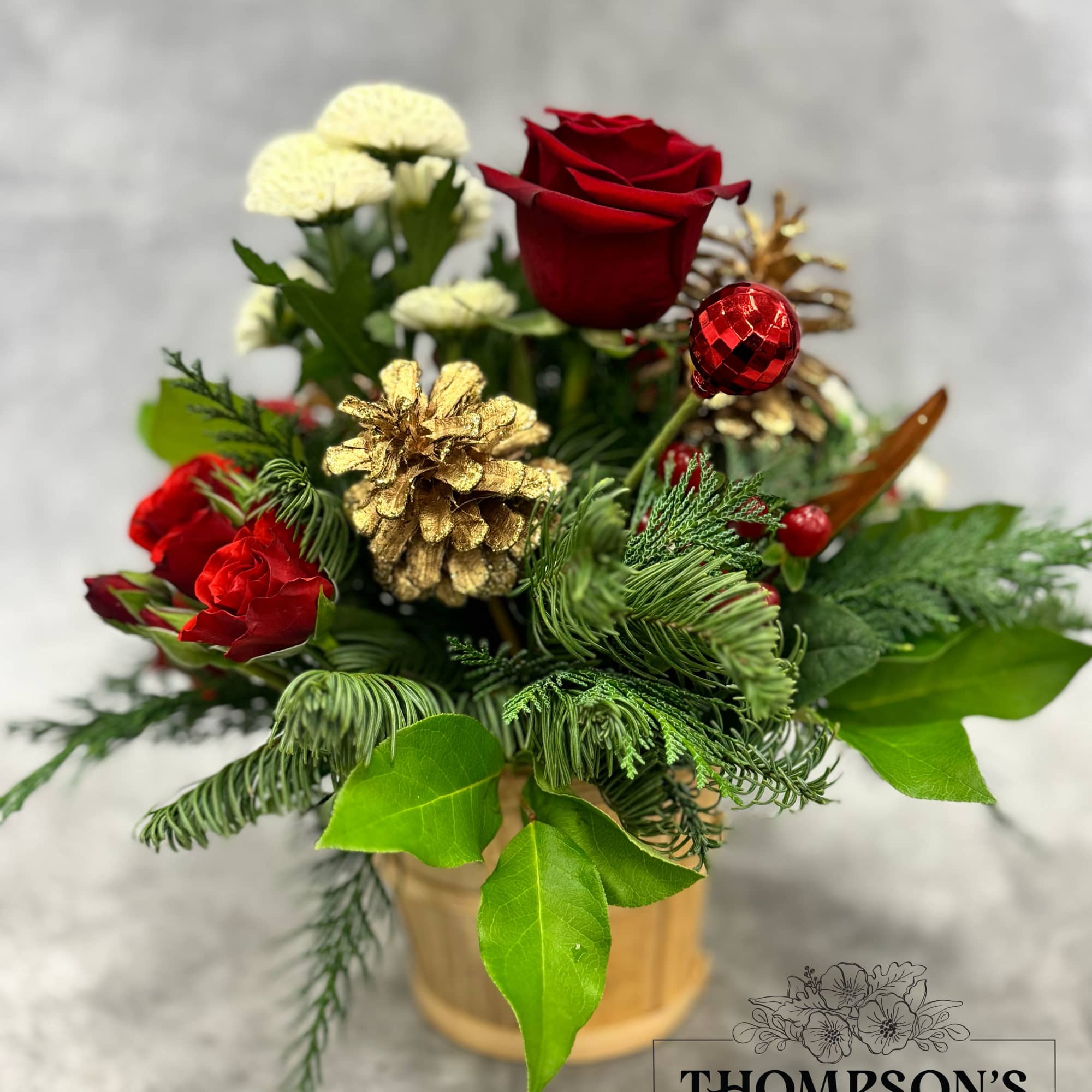 Celebrate the season with Tidings, a cheerful holiday basket filled with festive