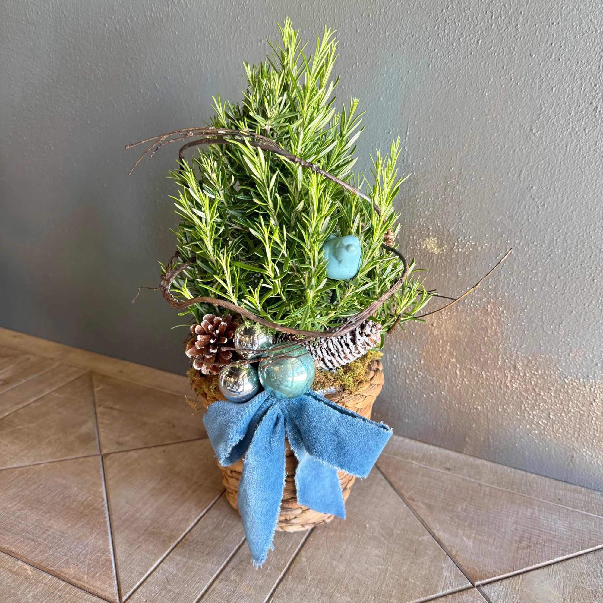These live plant rosemary trees are a sweet holiday touch. Each tree