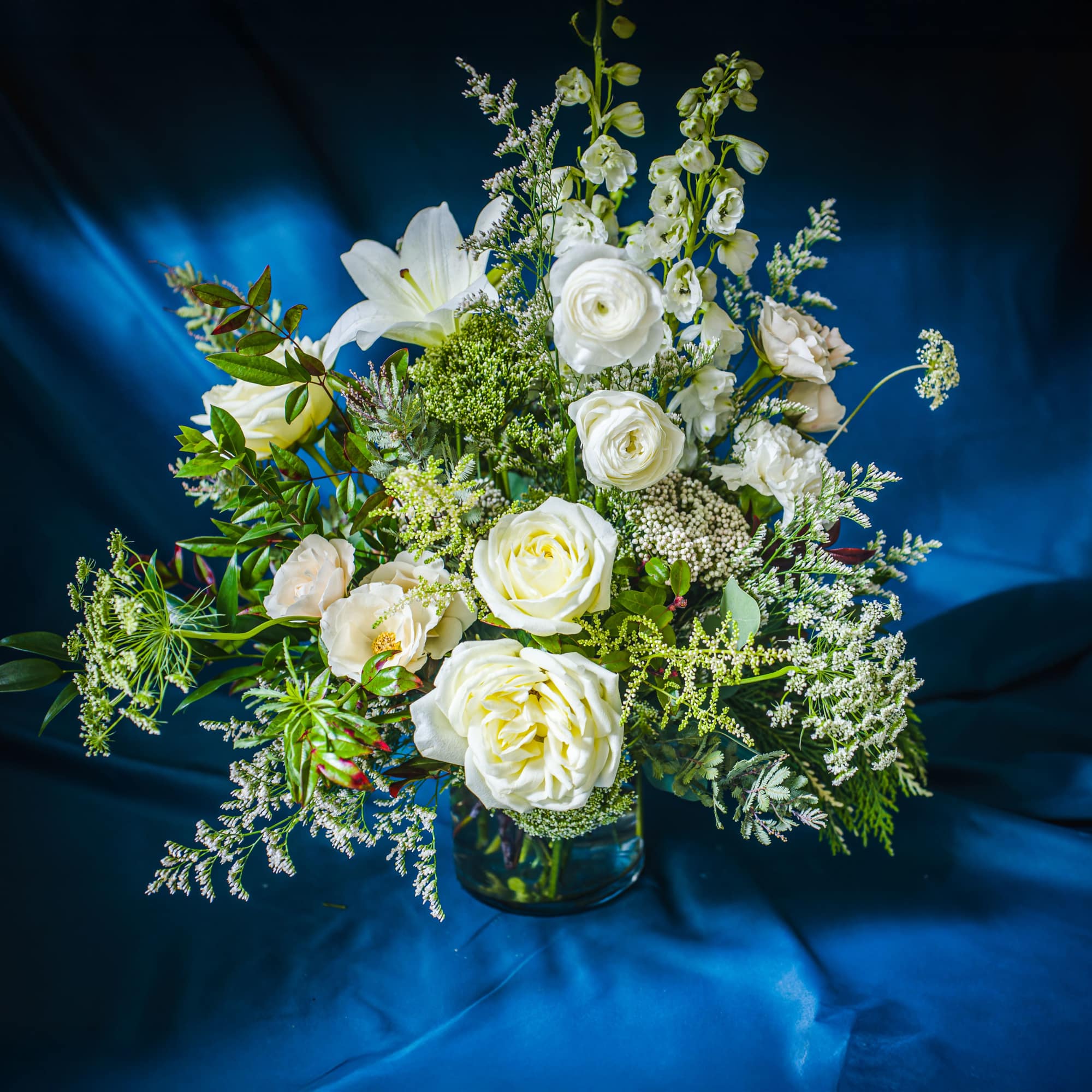 Layers of winter white and textural greens for a sophisticated, neutral palette.