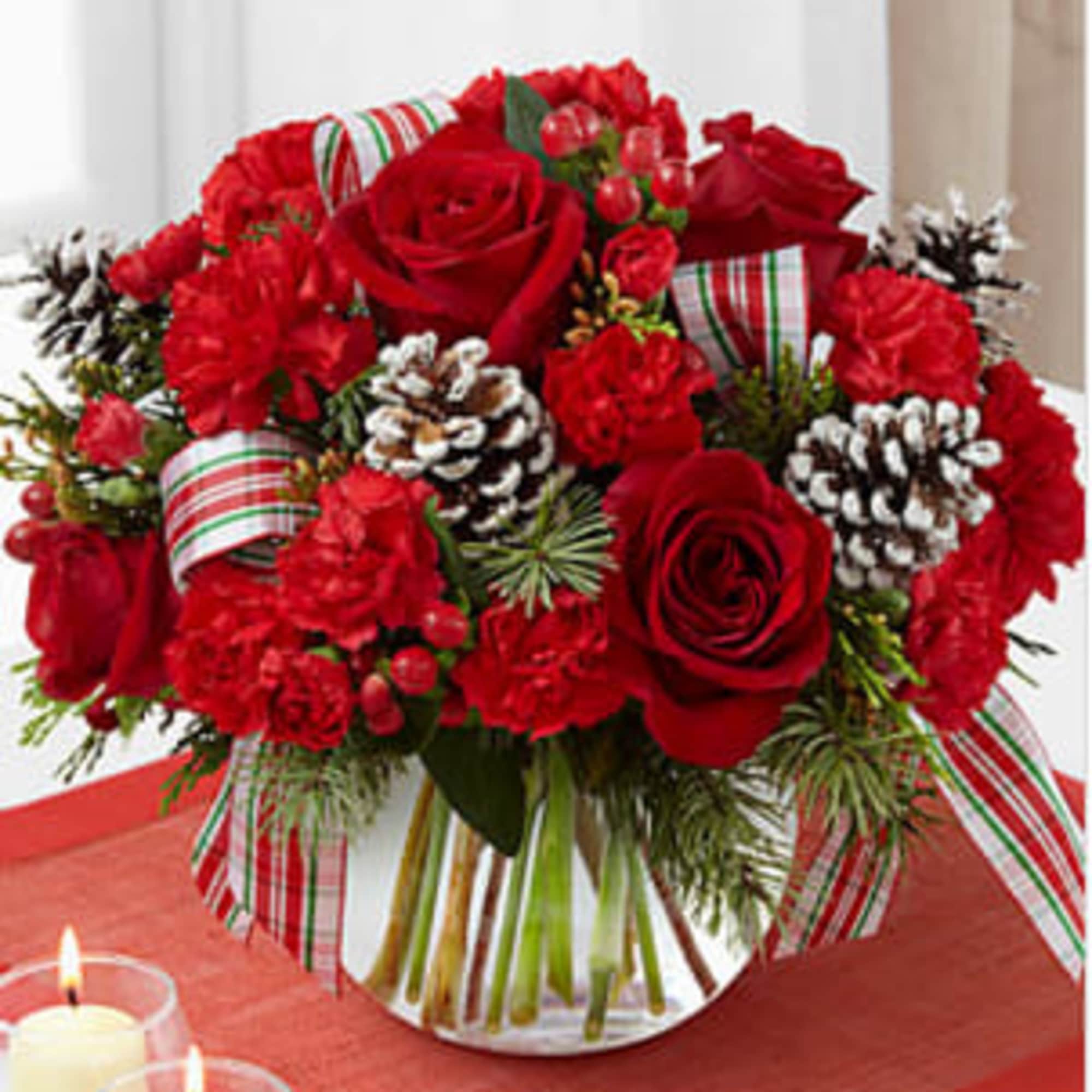 Red roses, burgundy lily, white stock, white spiders and green hypericum berries