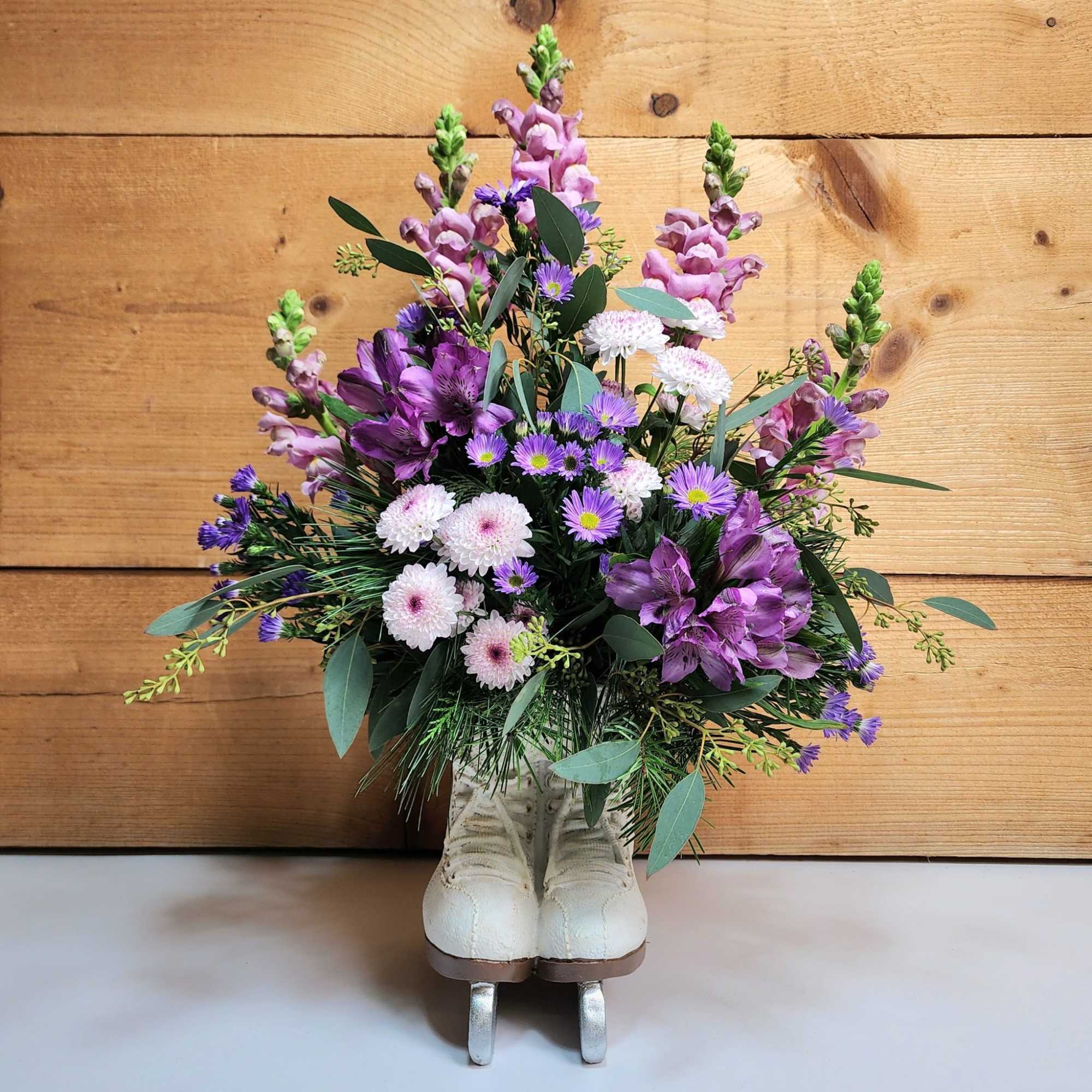 Blooms On Ice stars beautiful shades of purple flowers such as snapdragons