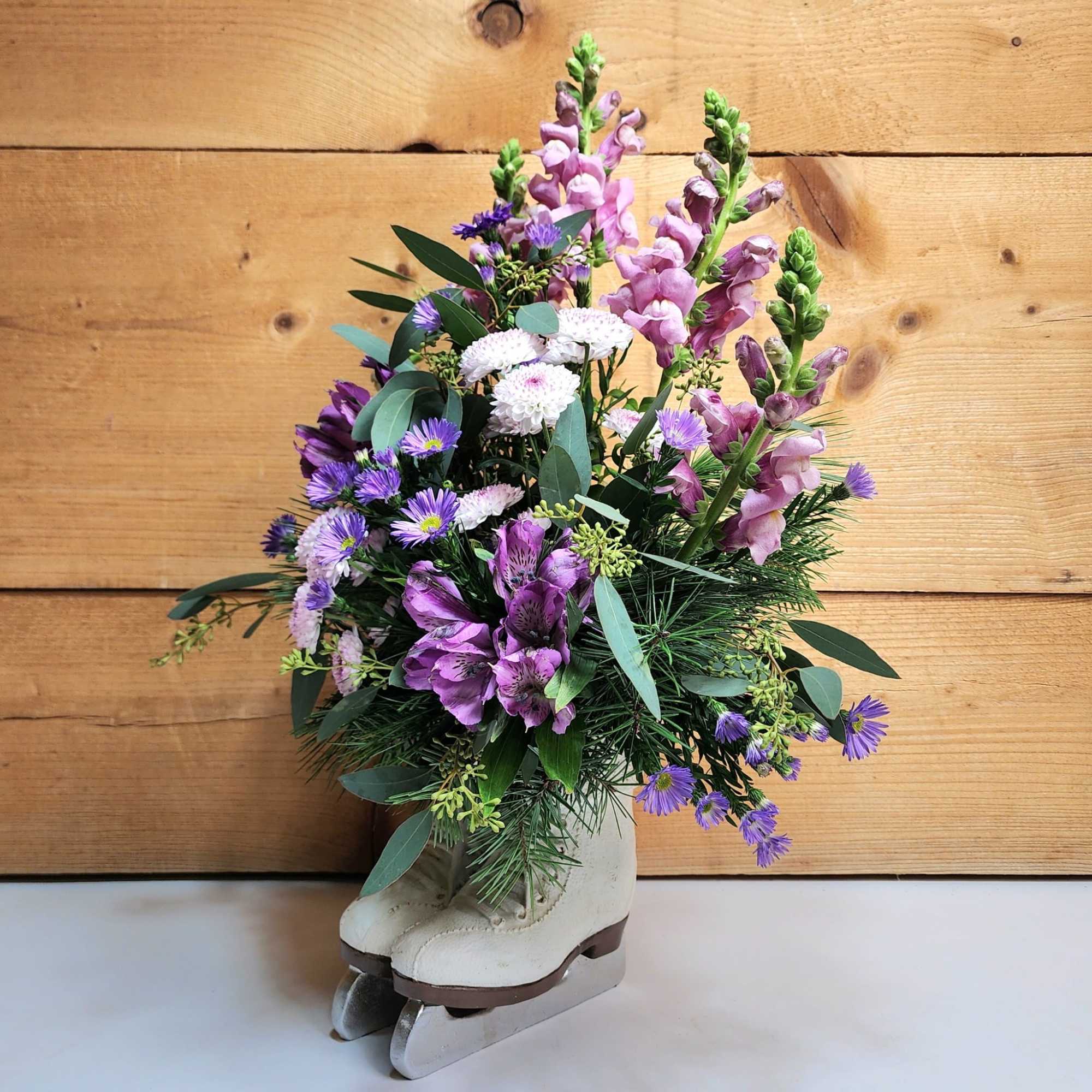 Blooms On Ice stars beautiful shades of purple flowers such as snapdragons