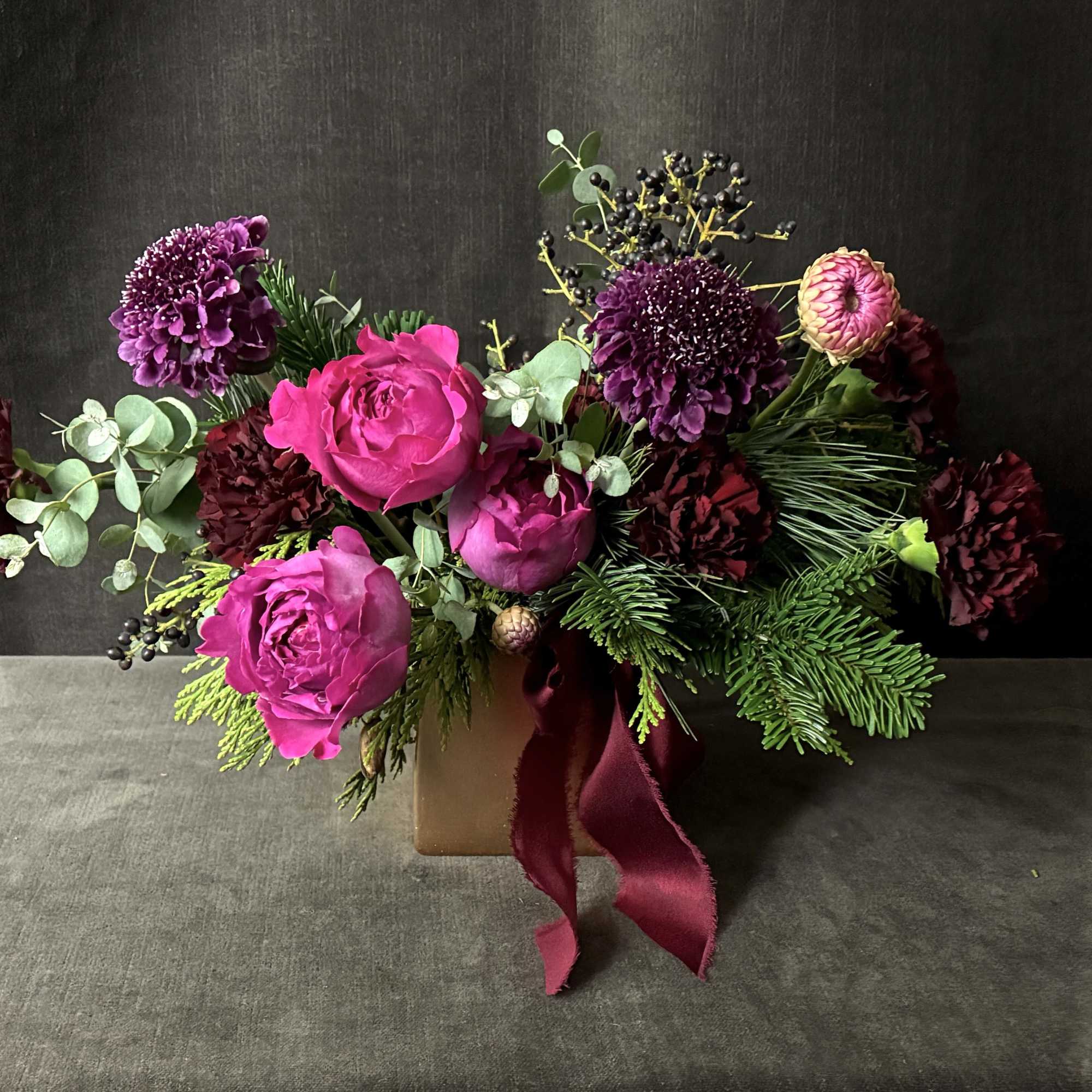 The Holiday Pops Collection bursts with Yves Piaget garden roses, deep wine