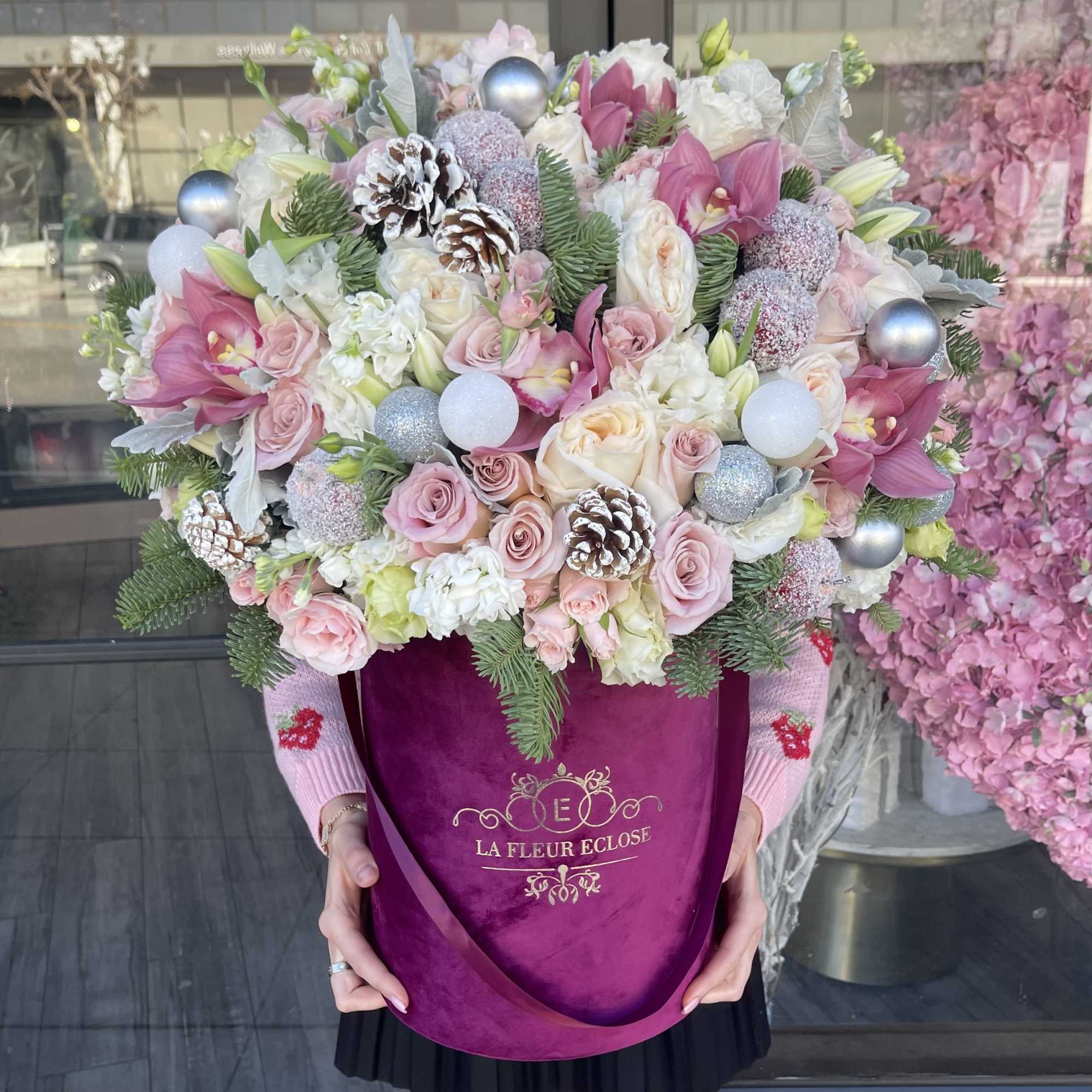Beautiful arrangement in our burgundy velvet box with Christmas ornaments 