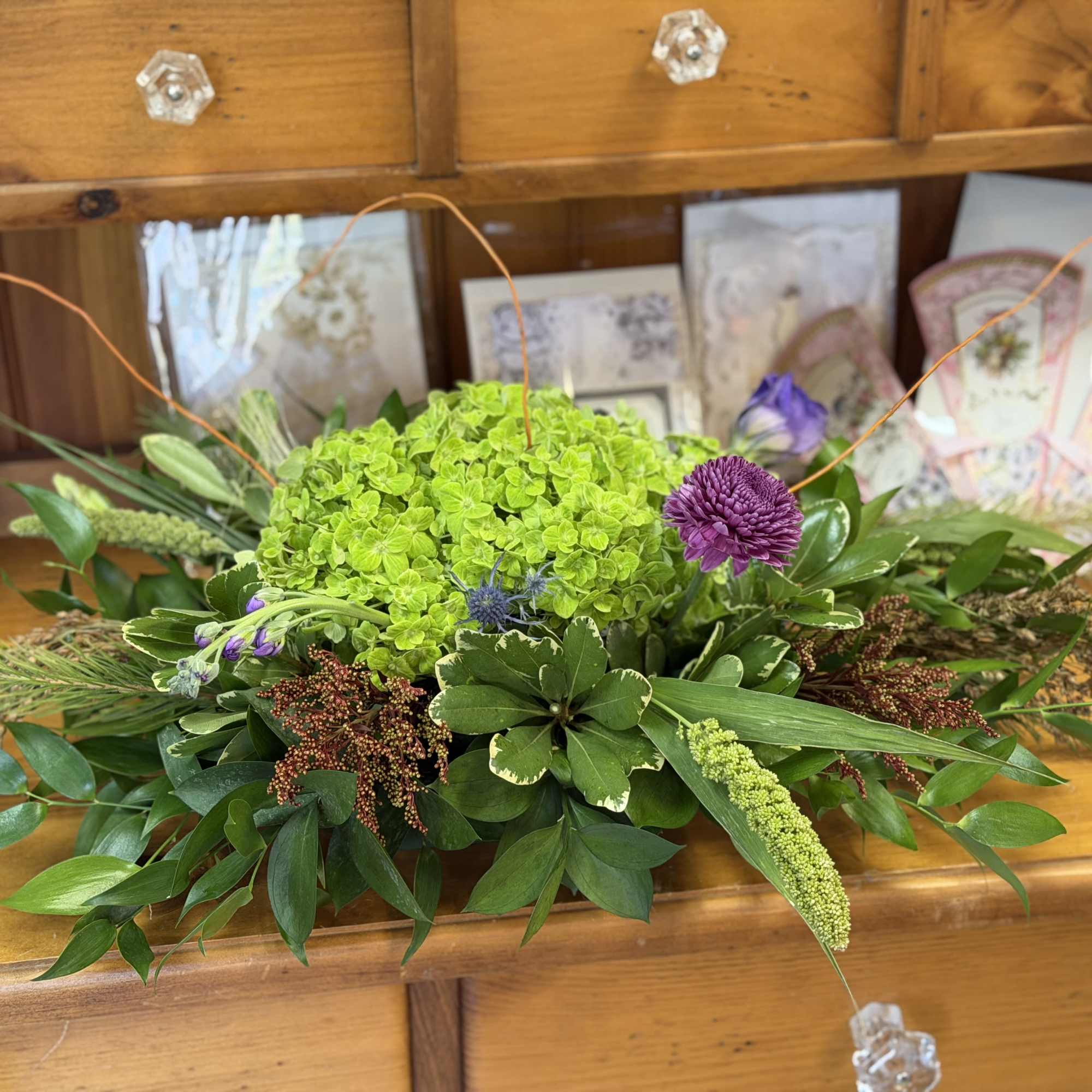 A beautiful centerpiece for any table this holiday season. Green Hydrangea, roses
