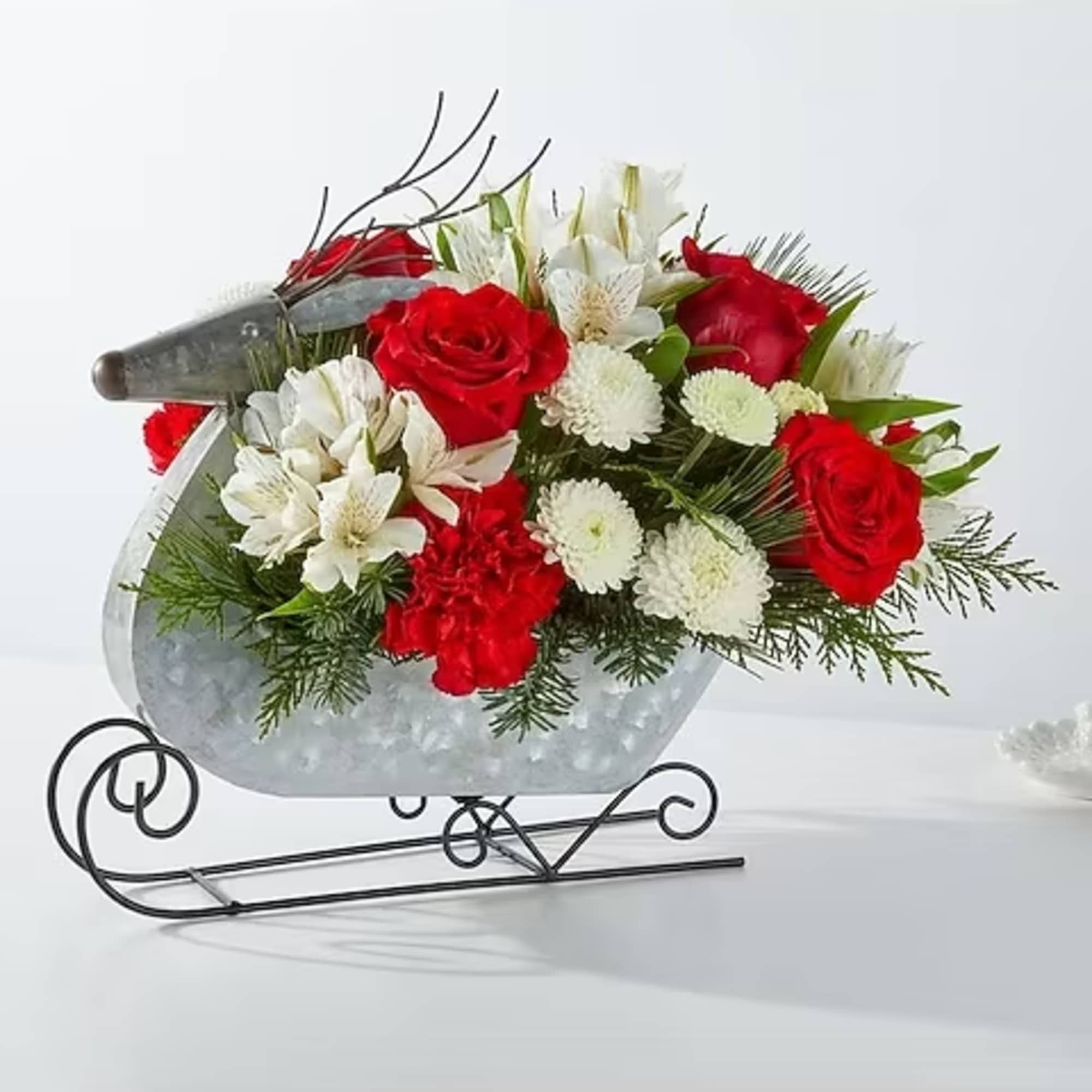 Fly into Christmas Eve with this dashing bouquet designed in a reindeer