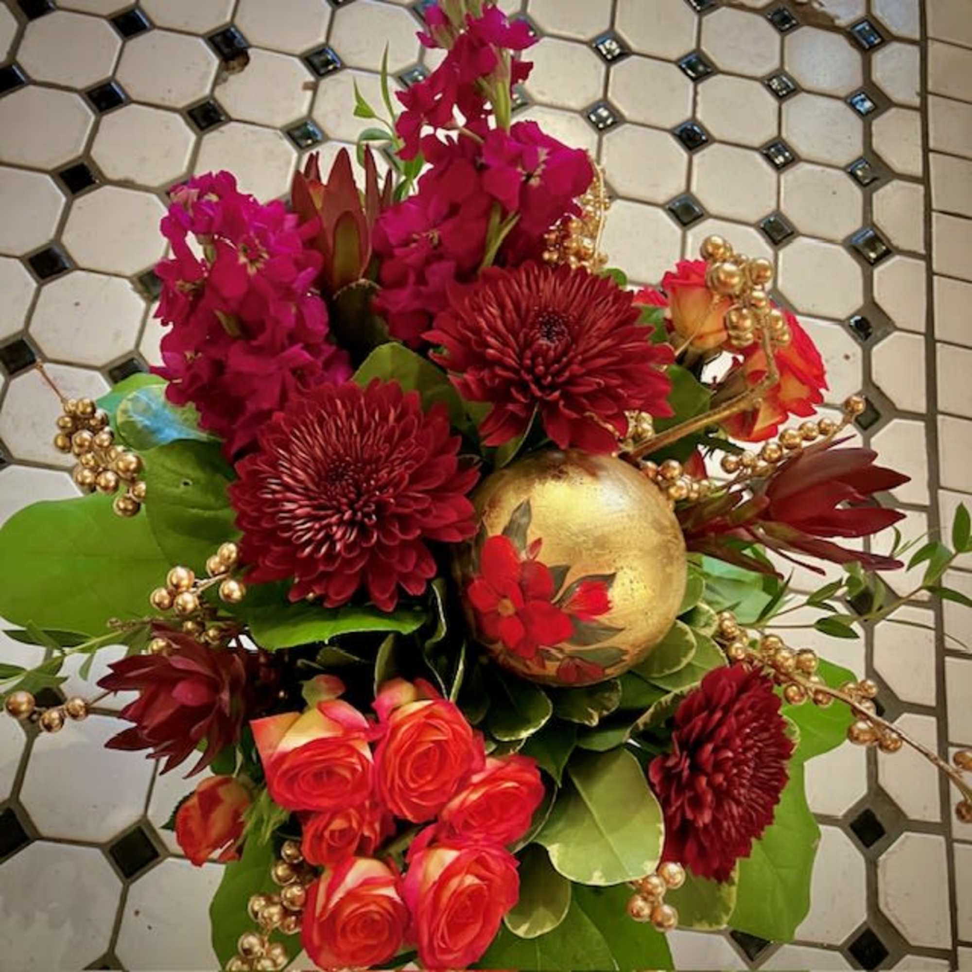 This cheerful cozy bouquet is sure to bring warmth and light into