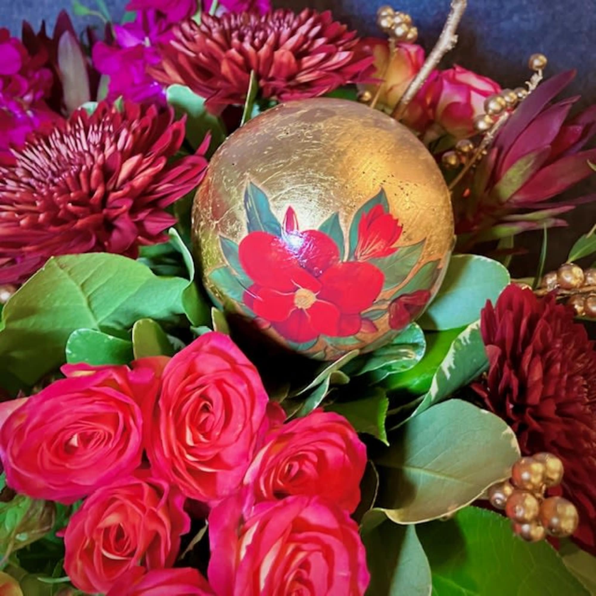 This cheerful cozy bouquet is sure to bring warmth and light into