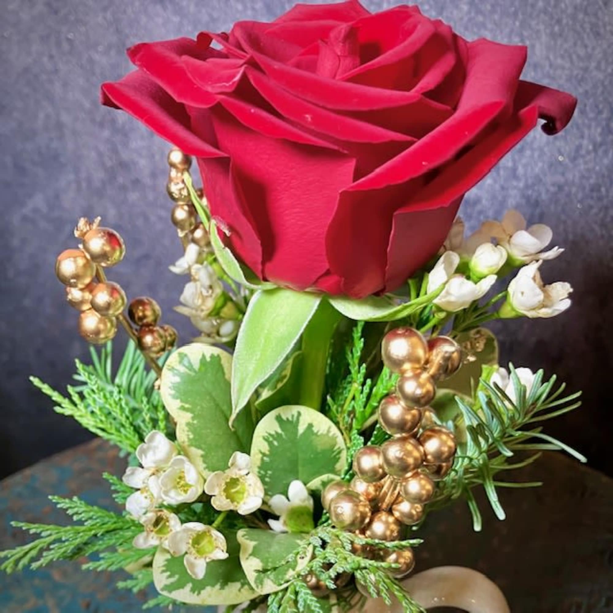 This sweet and petite arrangement makes the perfect gift to bring a