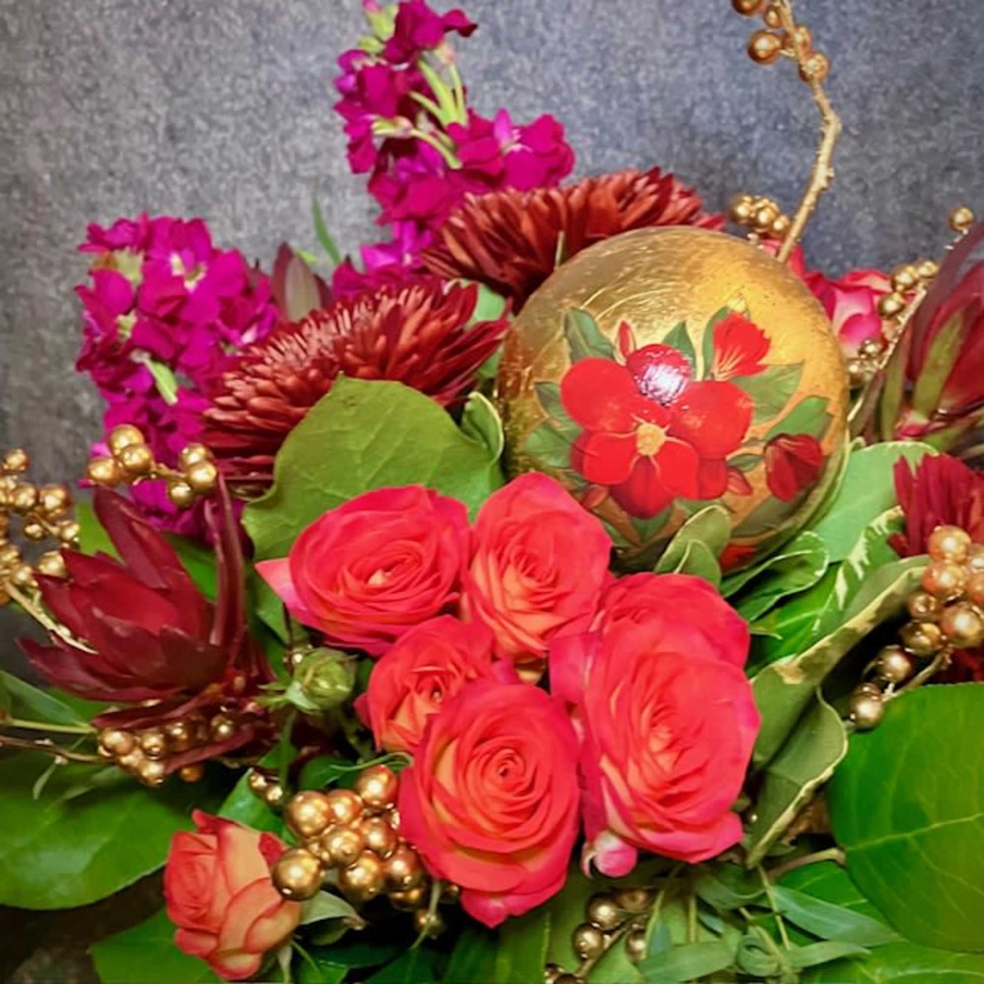 This sweet and petite arrangement makes the perfect gift to bring a