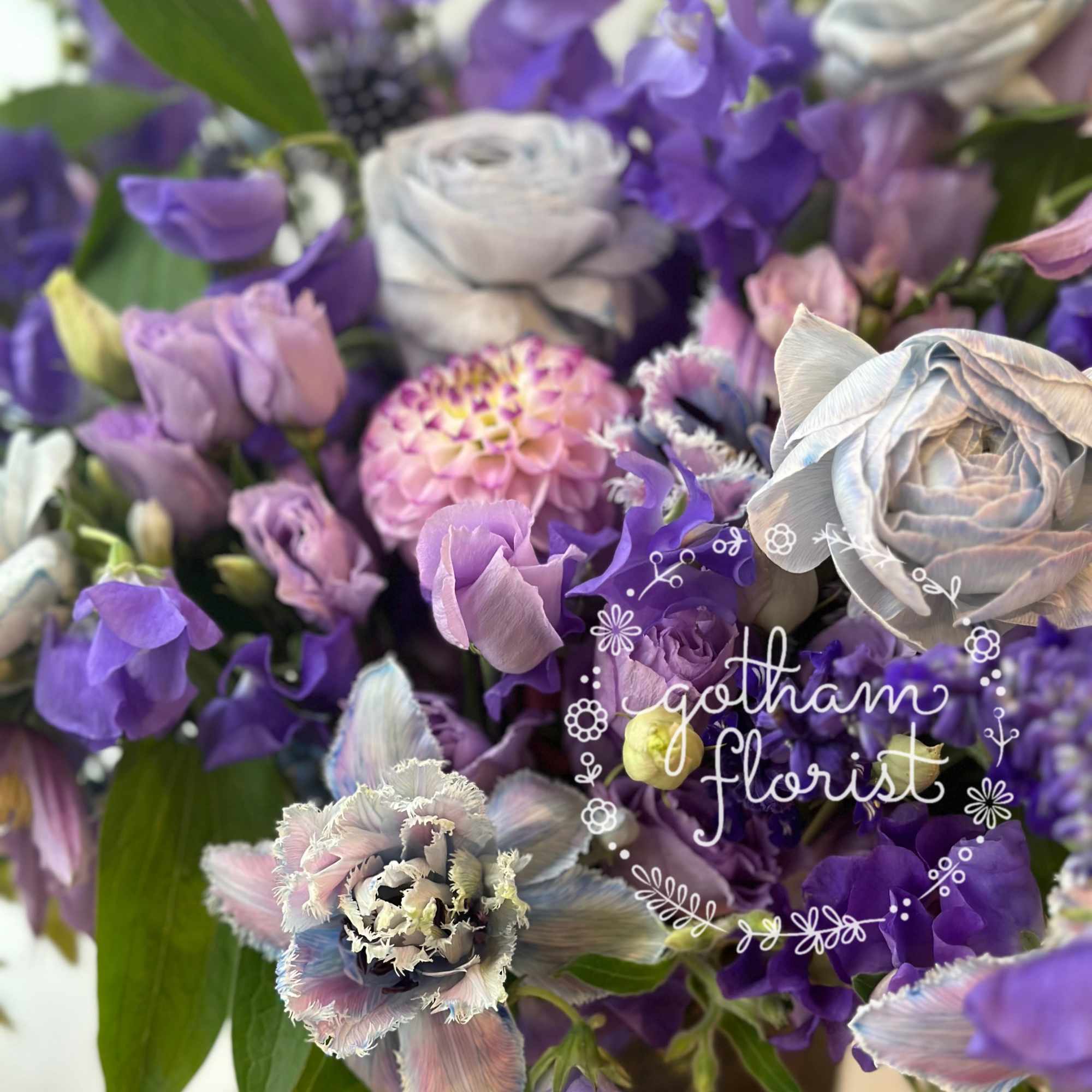 Our enchanting Whimsical Design, brimming with an exquisite selection of seasonal flowers.