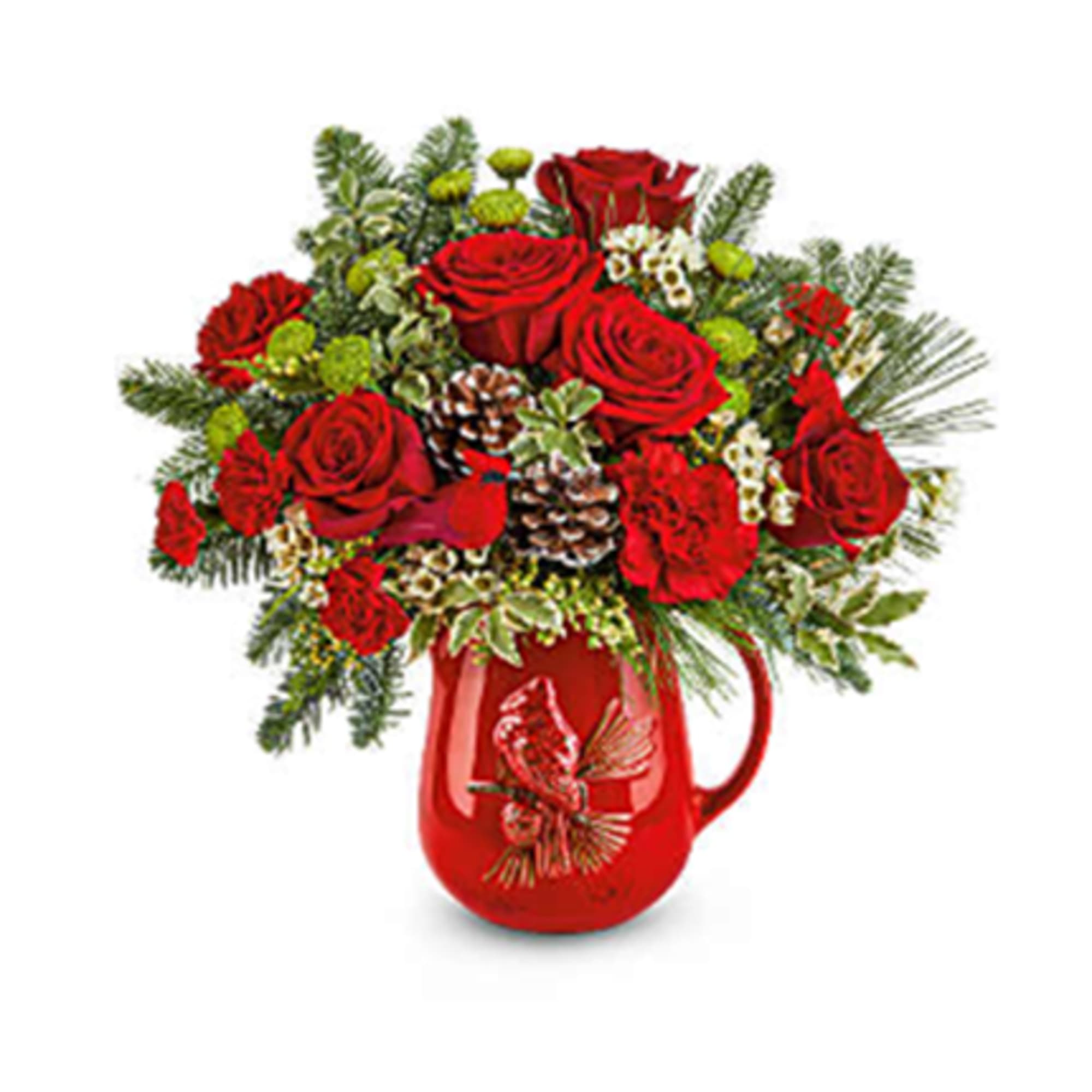 Festive Flight Bouquet spreads holiday cheer with red blooms, winter greens, and