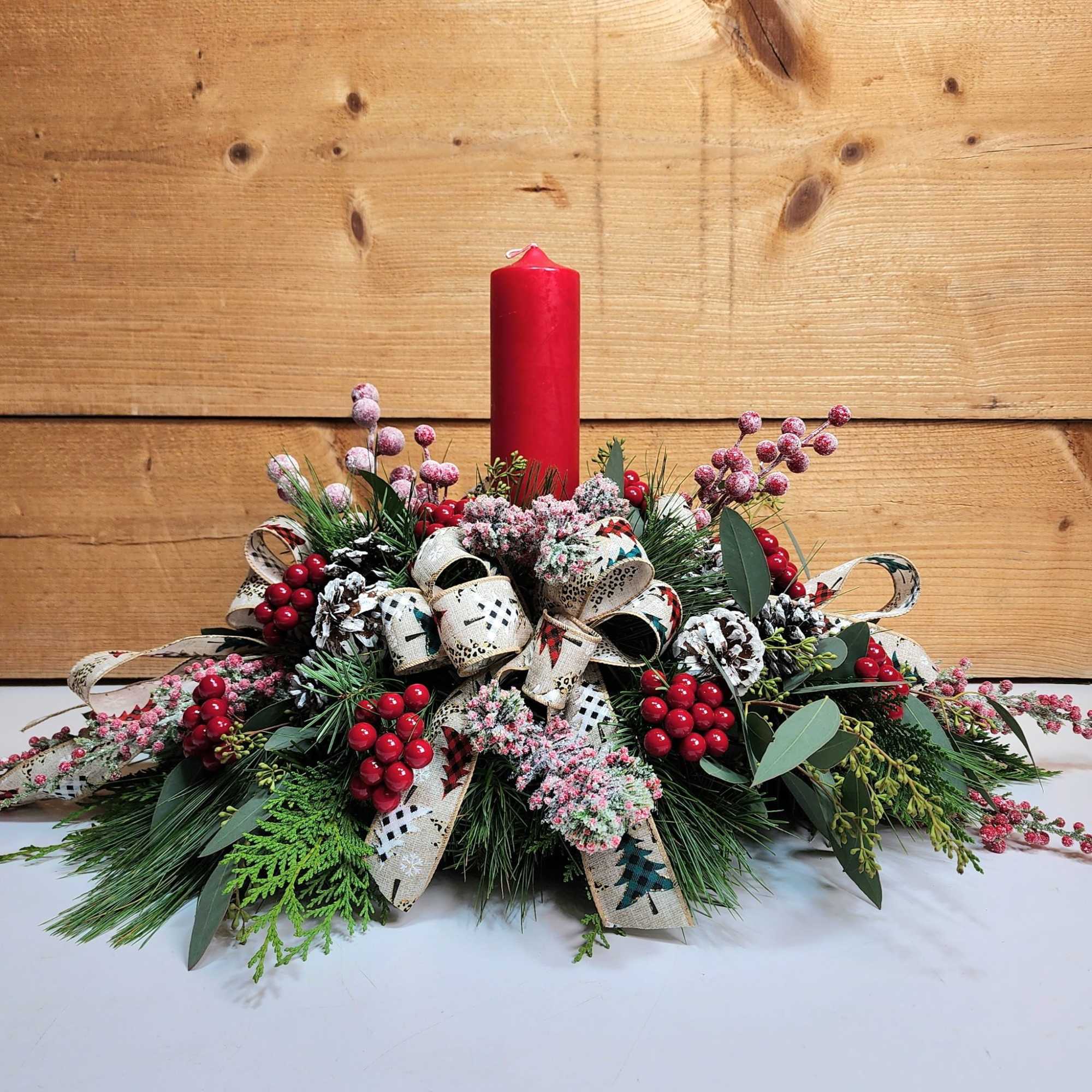 Winter Warmth combines stunning blooms and lovely candle light into one amazing