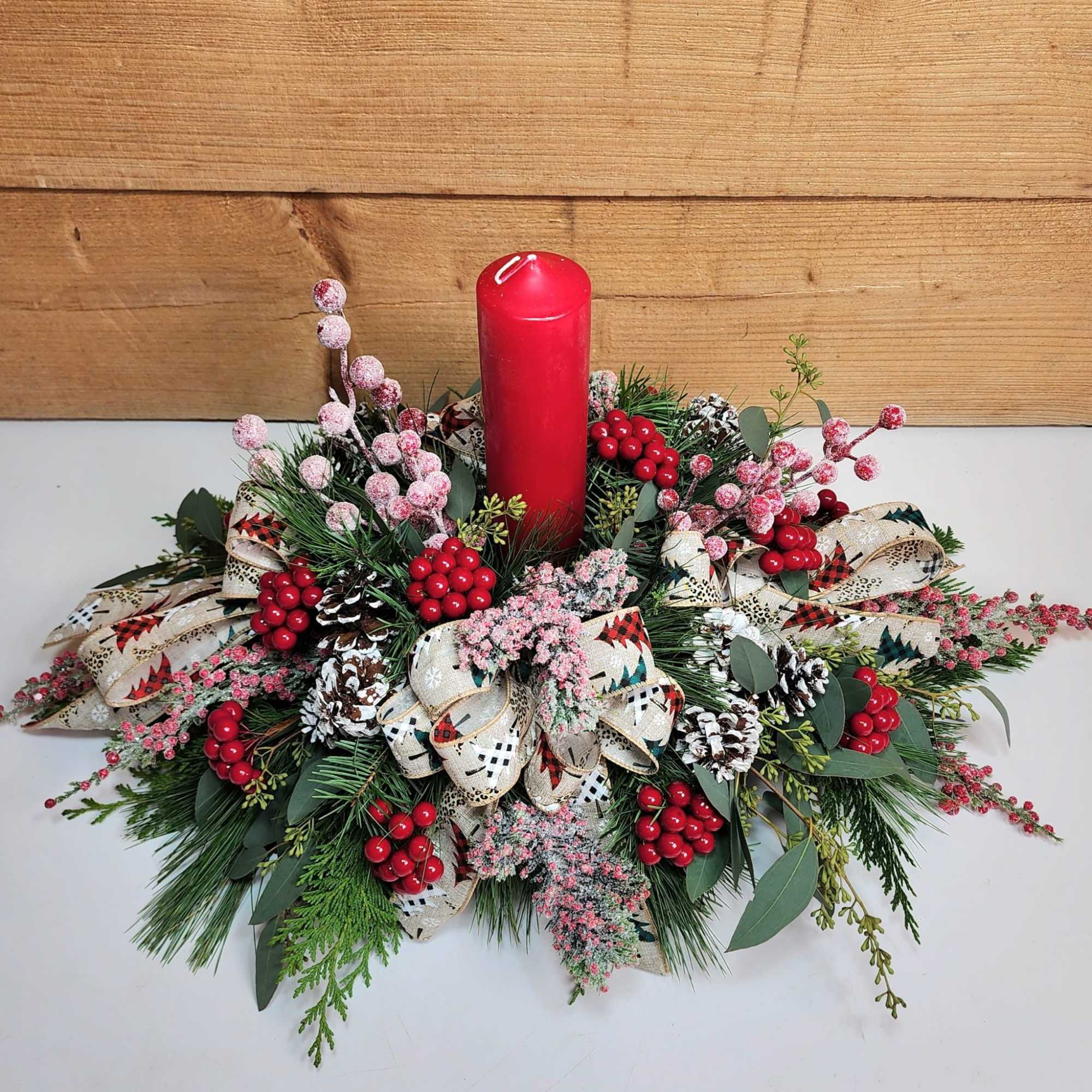 Winter Warmth combines stunning blooms and lovely candle light into one amazing