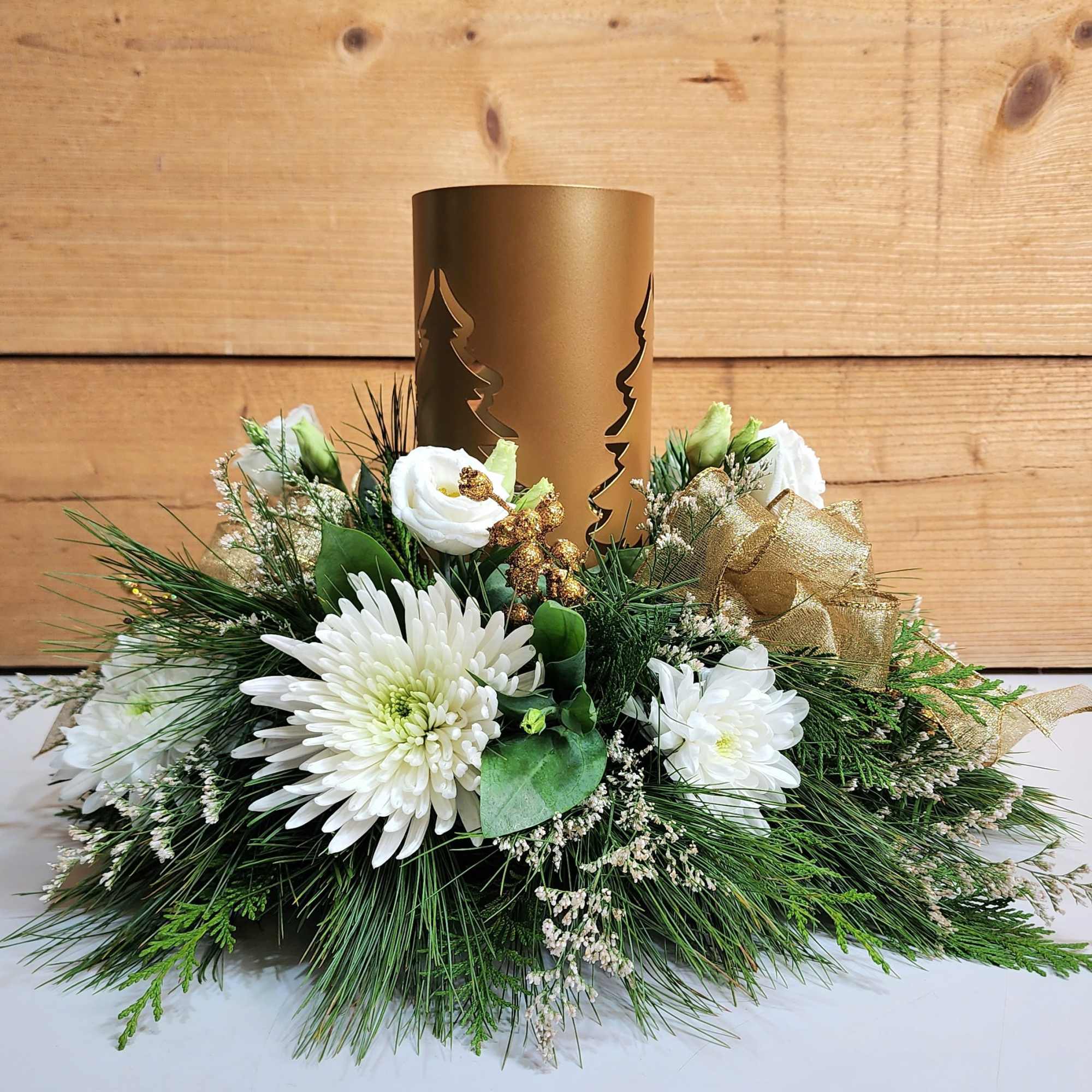 Feel the warmth of holiday delight with our Golden Evergreen Centerpiece! This