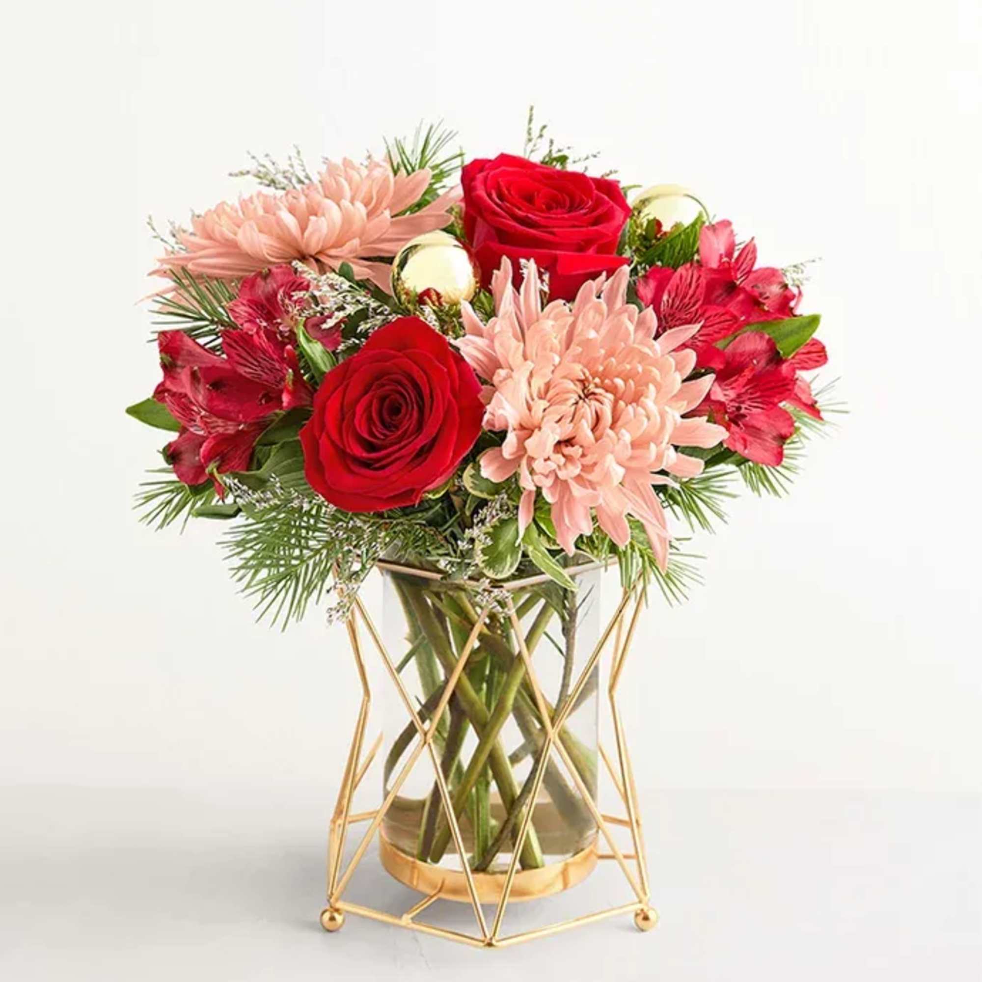 The very definition of merry and bright, this bouquet brings both classic