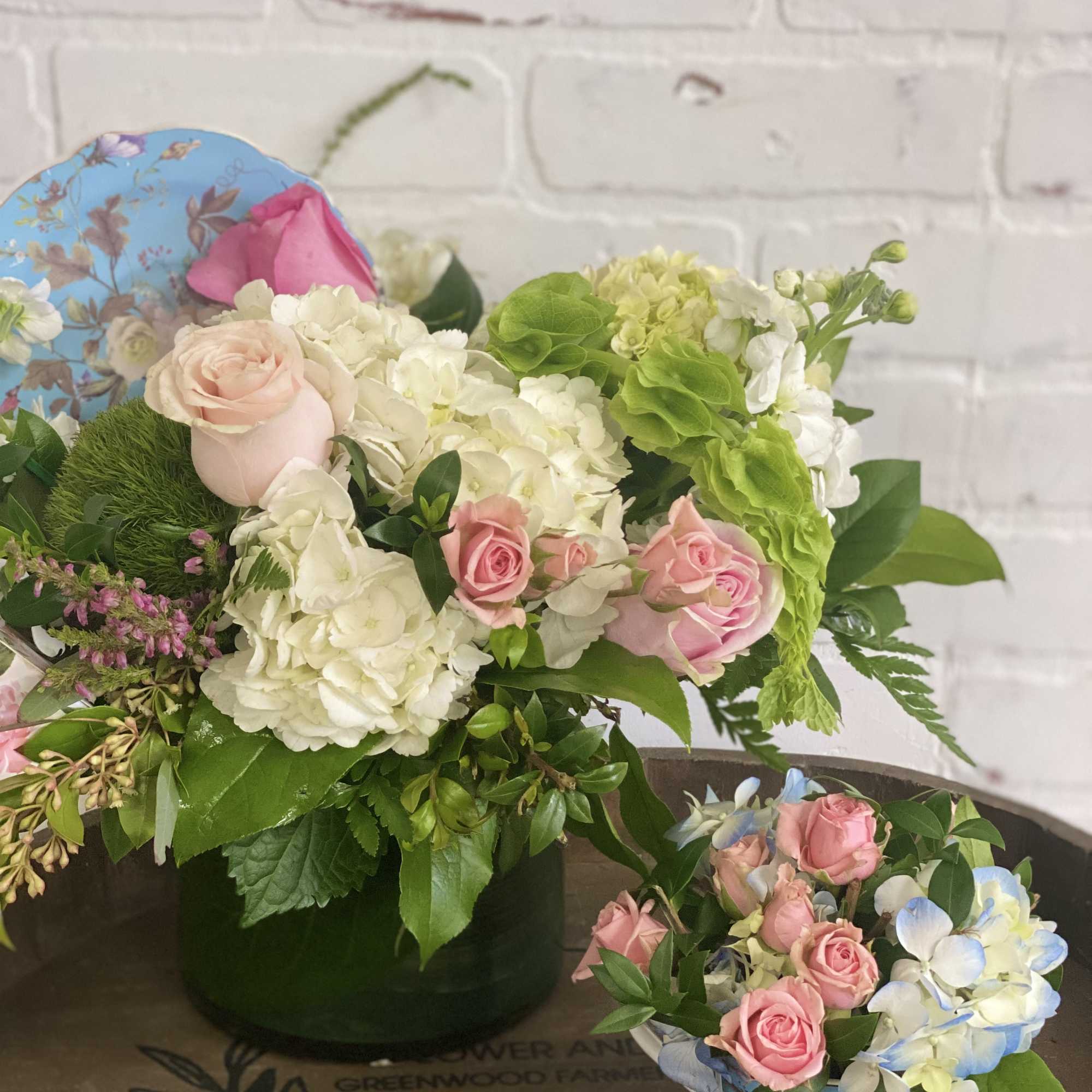 Tea party in a vase! Includes beautiful flower arrangement with a cute