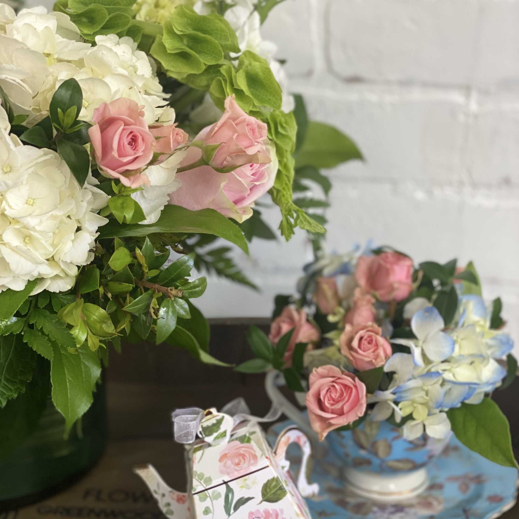 Tea party in a vase! Includes beautiful flower arrangement with a cute