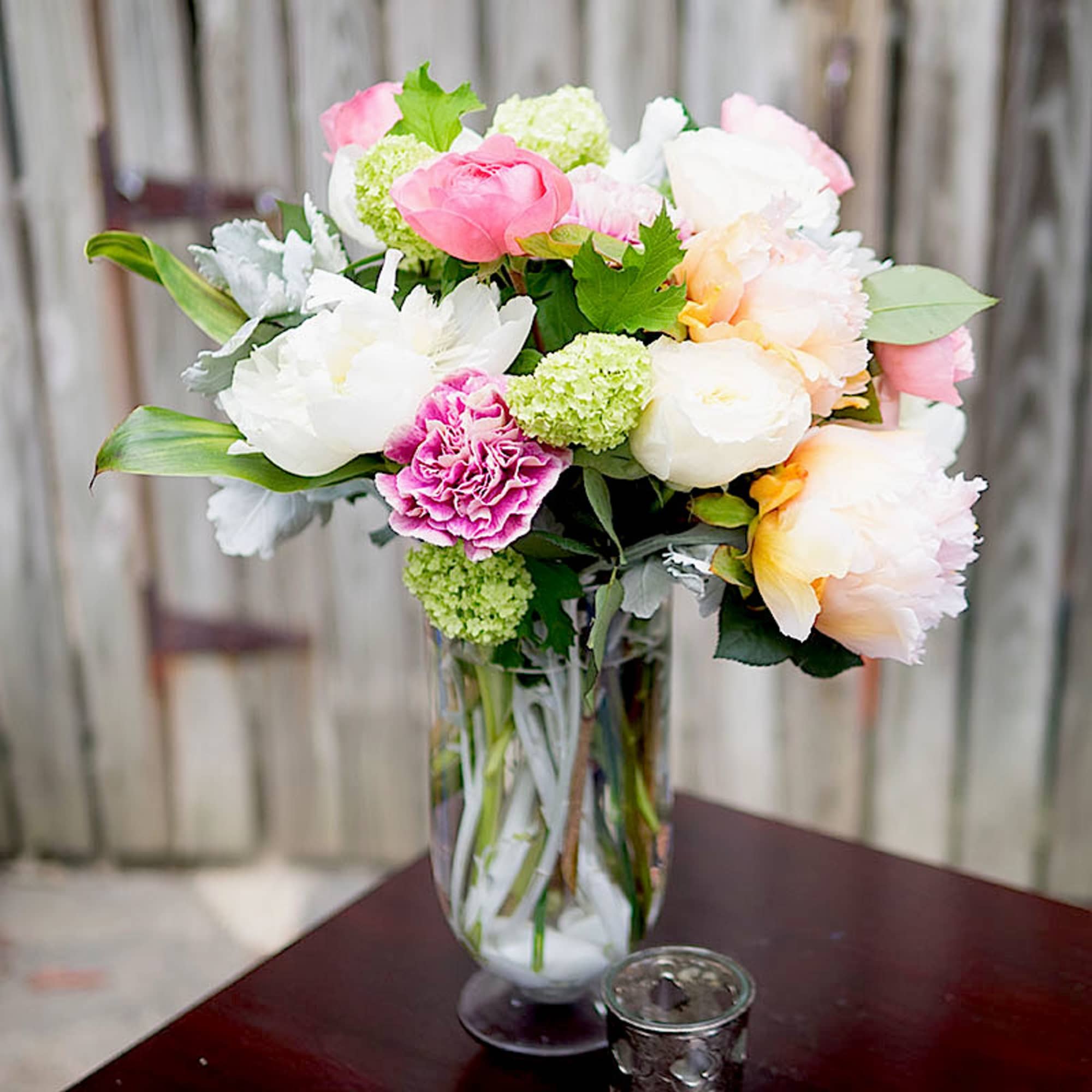 Peonies, roses and few other interesting blossoms compose this collection, perfect gift