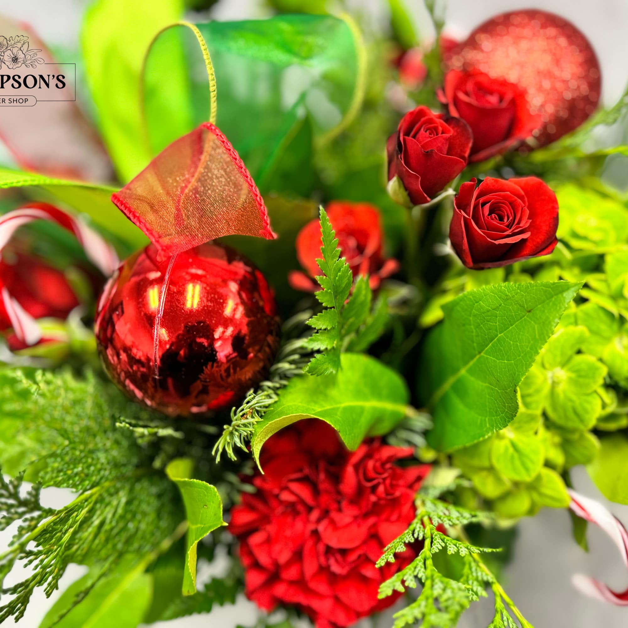 Spread some merry cheer with Jolly, a vibrant holiday arrangement bursting with
