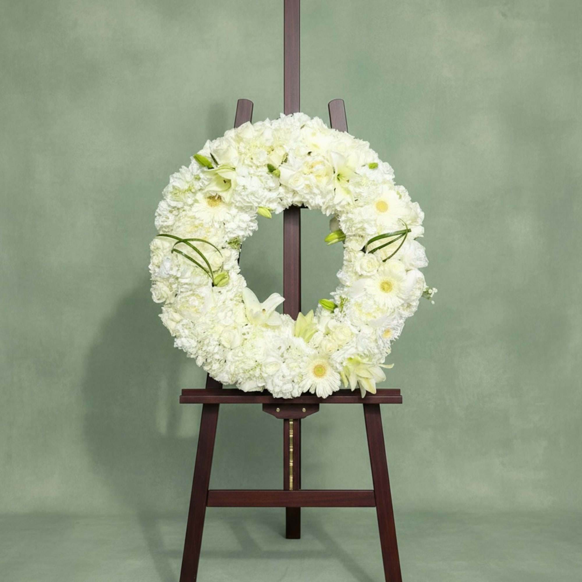 Funeral wreath with premium all white flowers 
21 inch