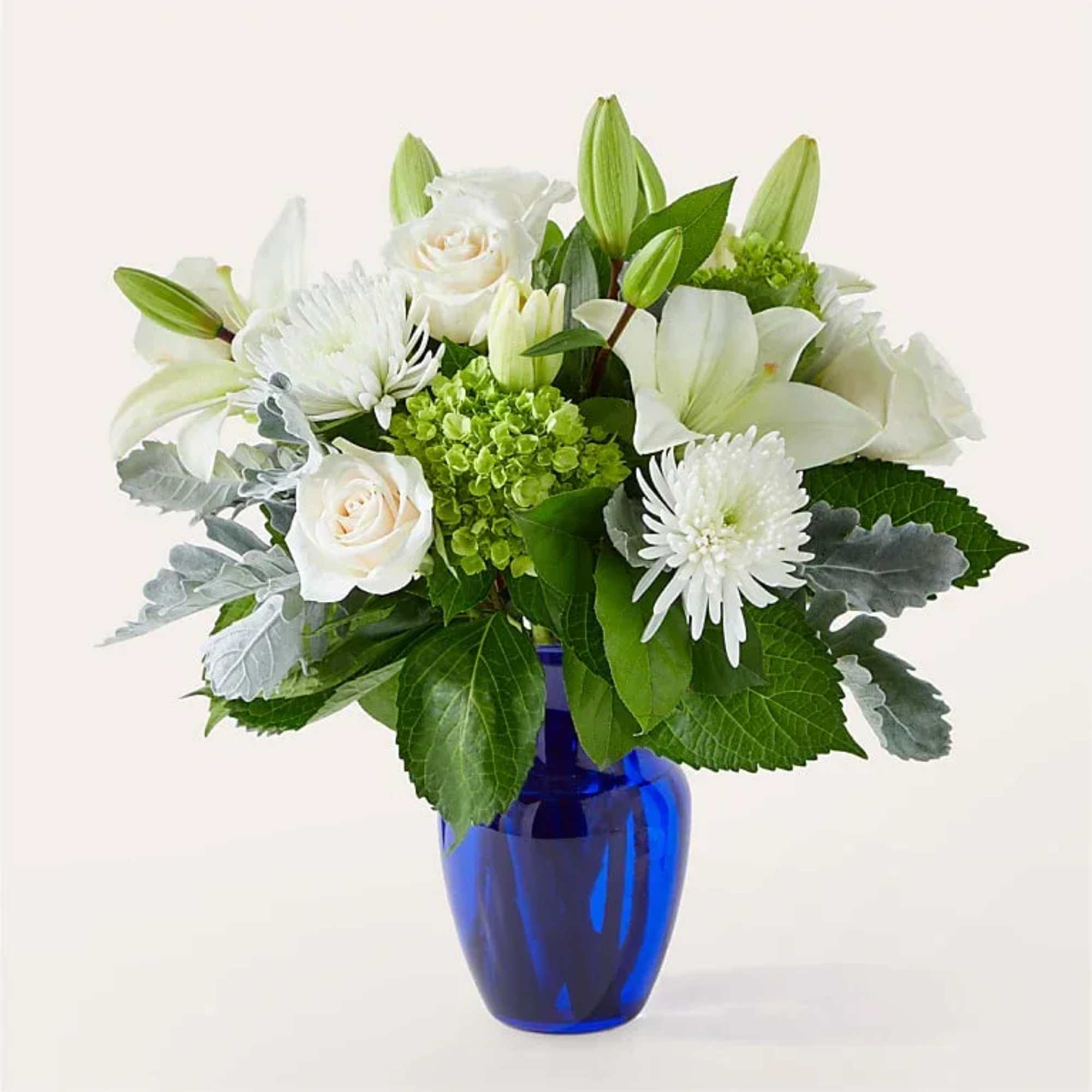 Our Snowy Dreams Bouquet is a stunning and elegant floral arrangement that