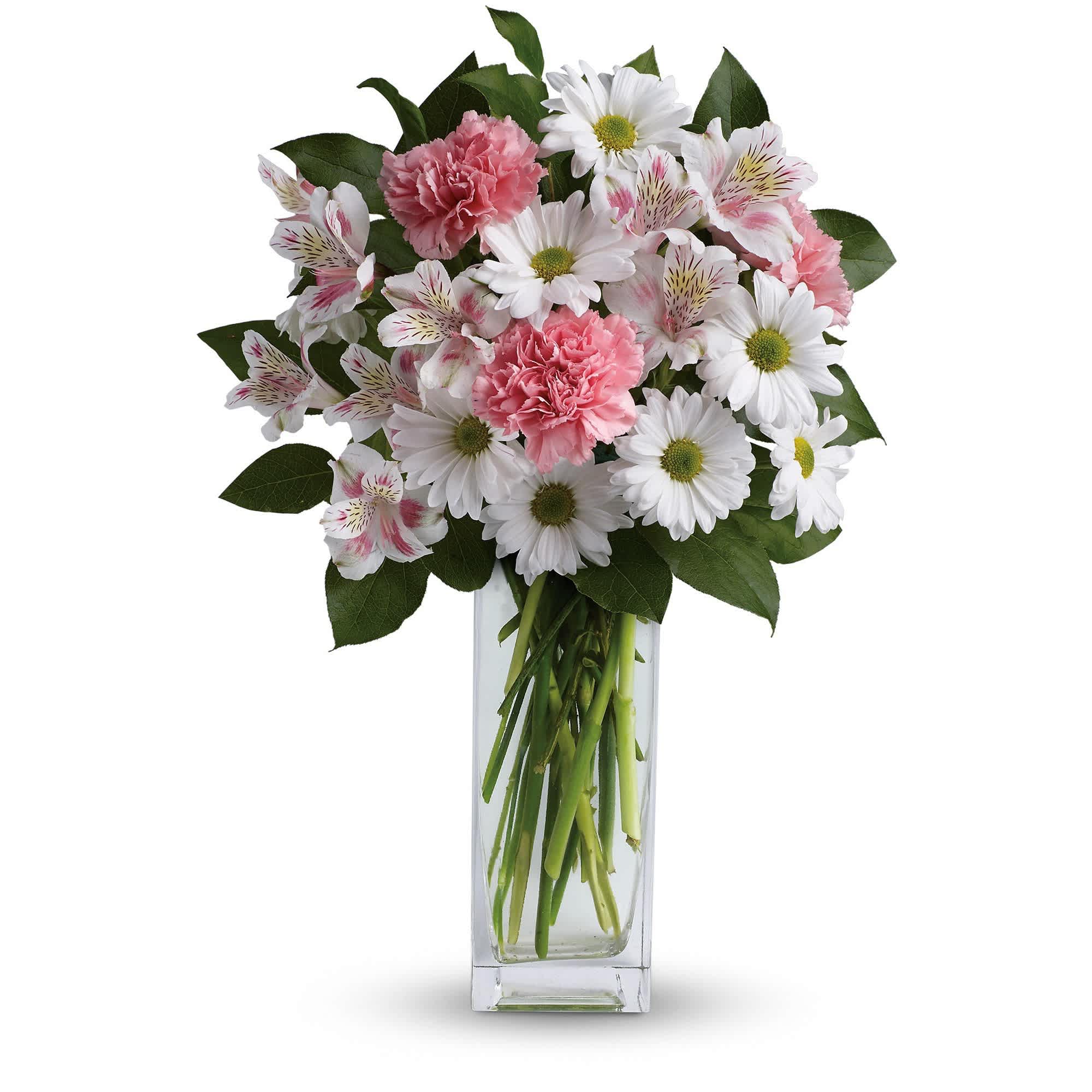 Soft and delicate, this pale pink and white bouquet speaks to the