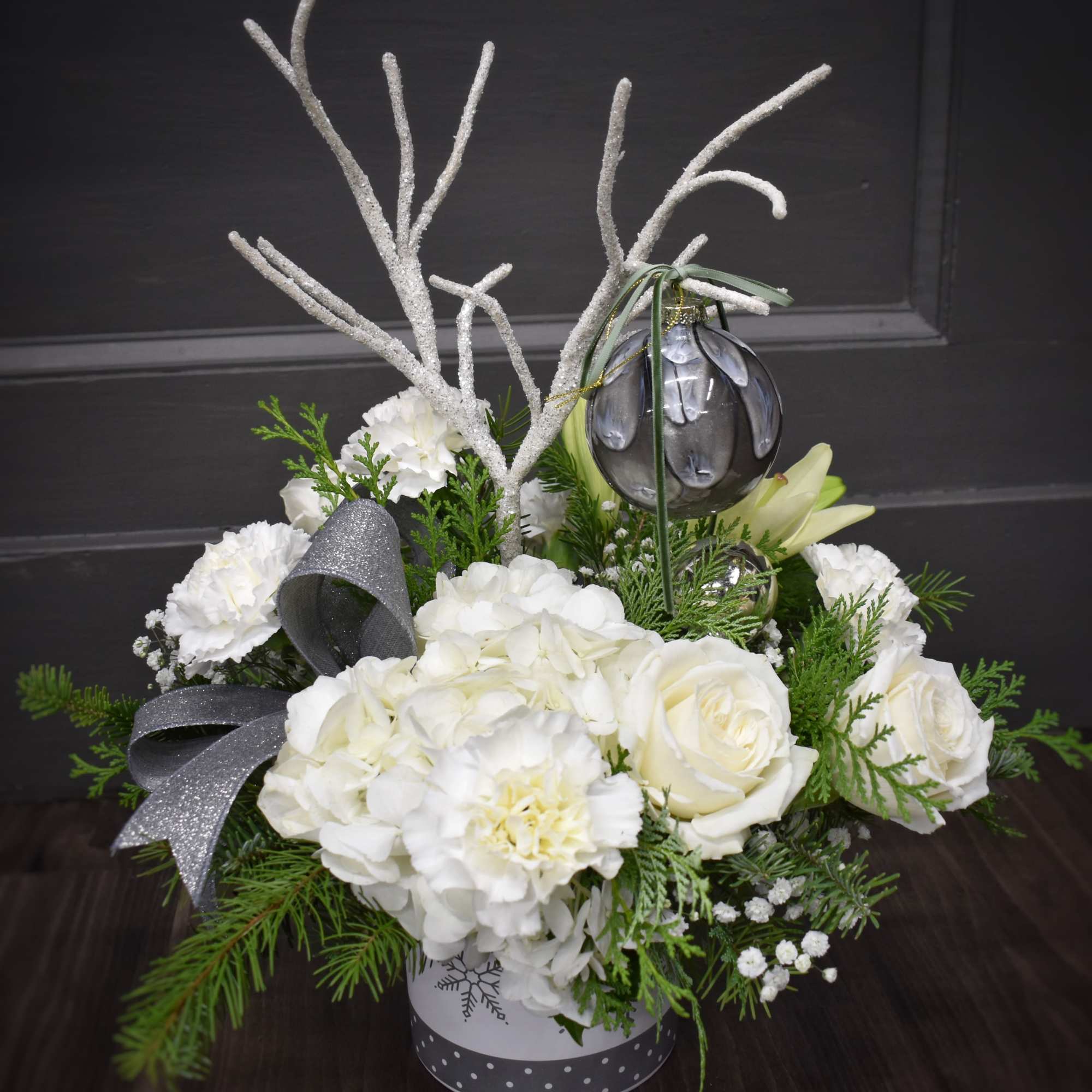 A snowy wonder, but without the snow! A large white hydrangea and