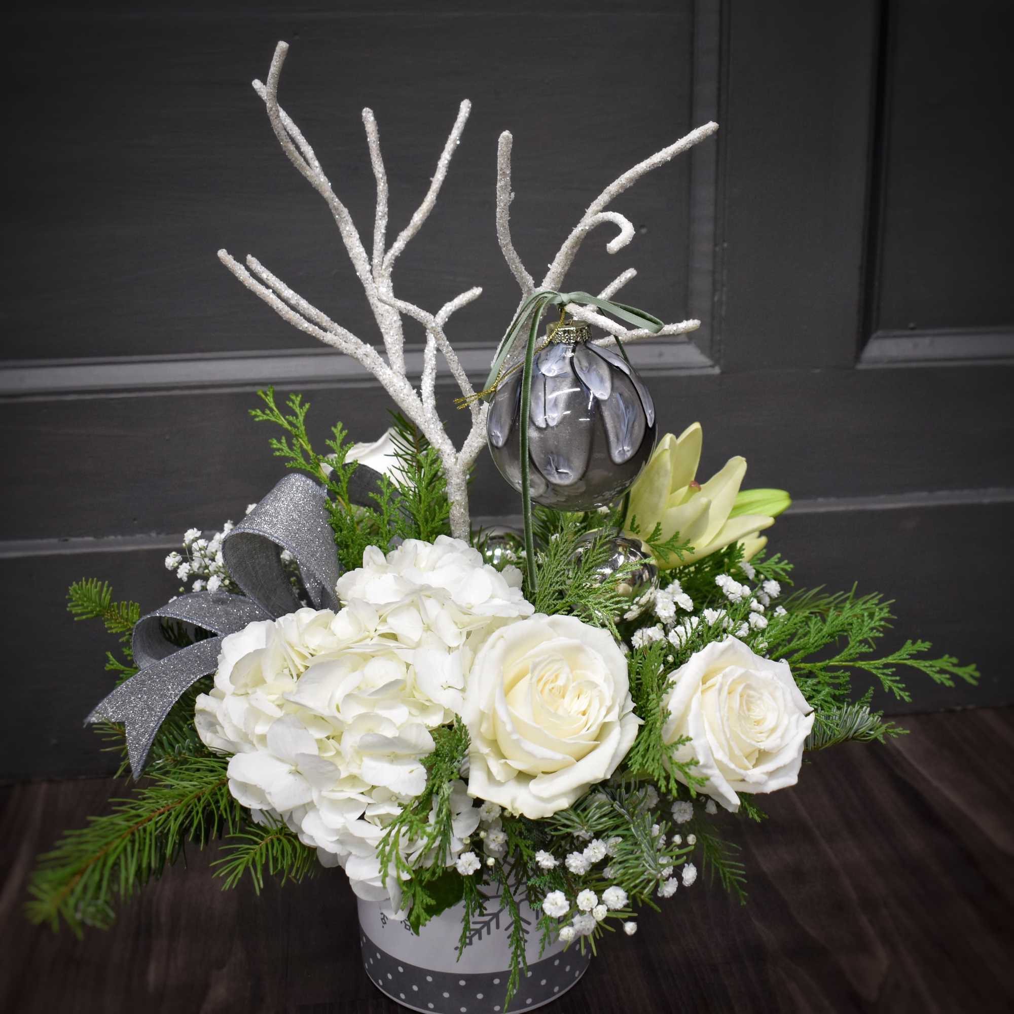 A snowy wonder, but without the snow! A large white hydrangea and