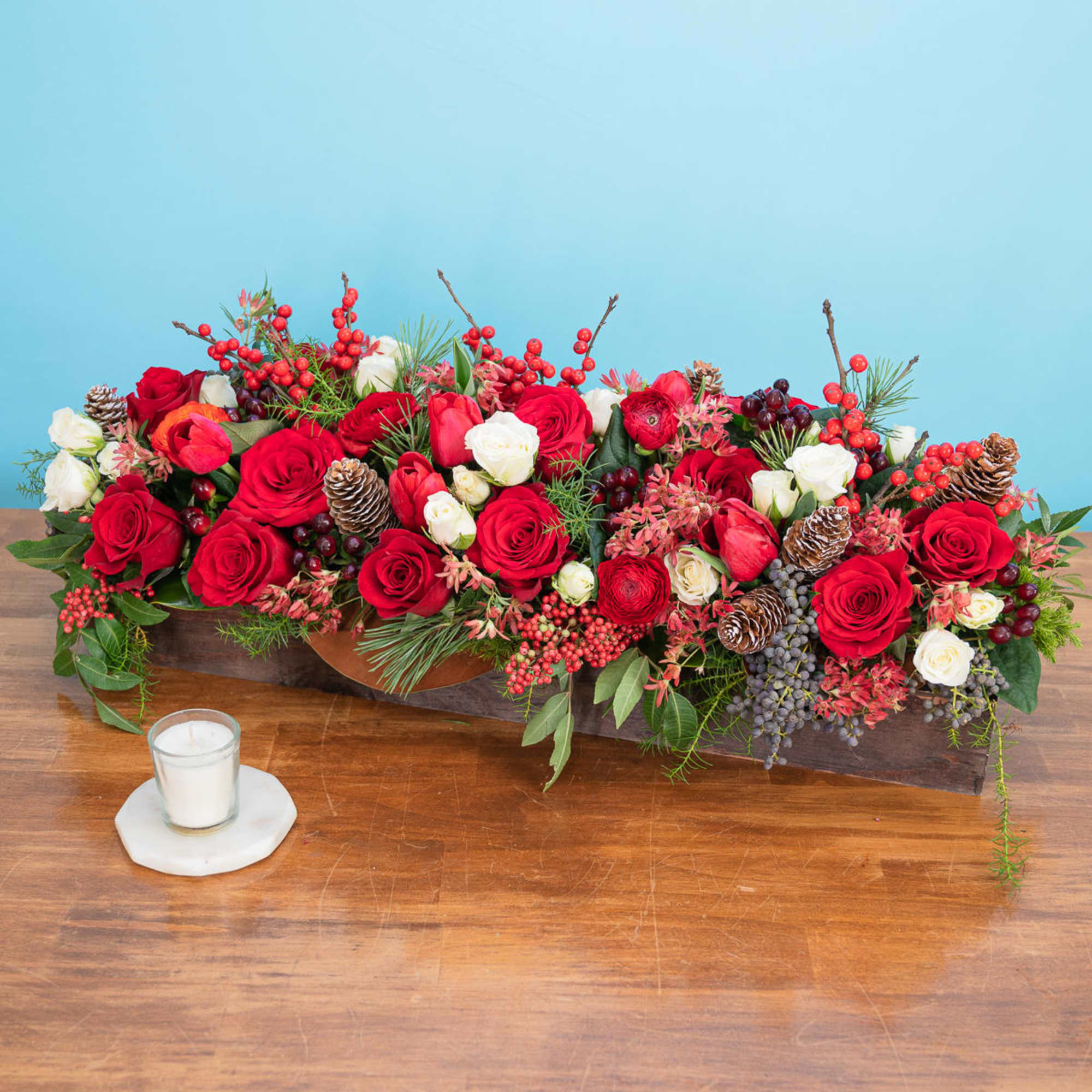 Crimson Winterland
Lush, festive, and beautifully abundant, Crimson Winterland captures the magic of