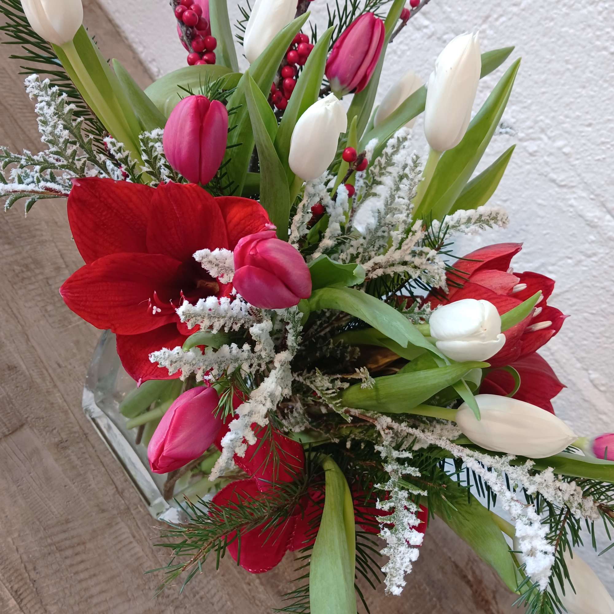 A festive and elegant flower arrangement that captures the spirit of the