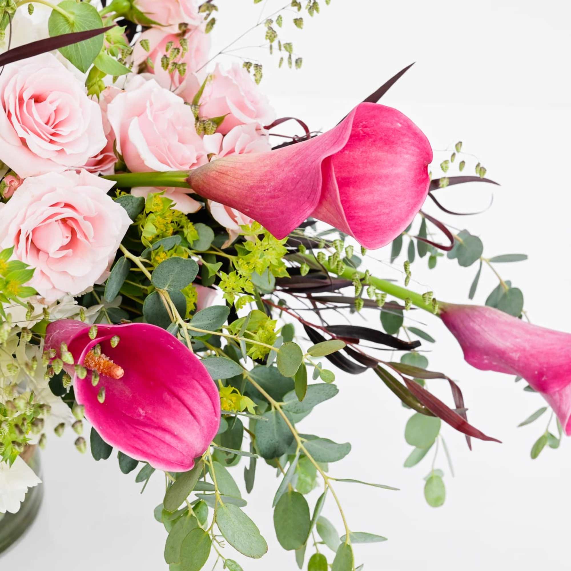 Carpe Diem

Carpe Diem is a sweeping, feminine arrangement built around vivid pink