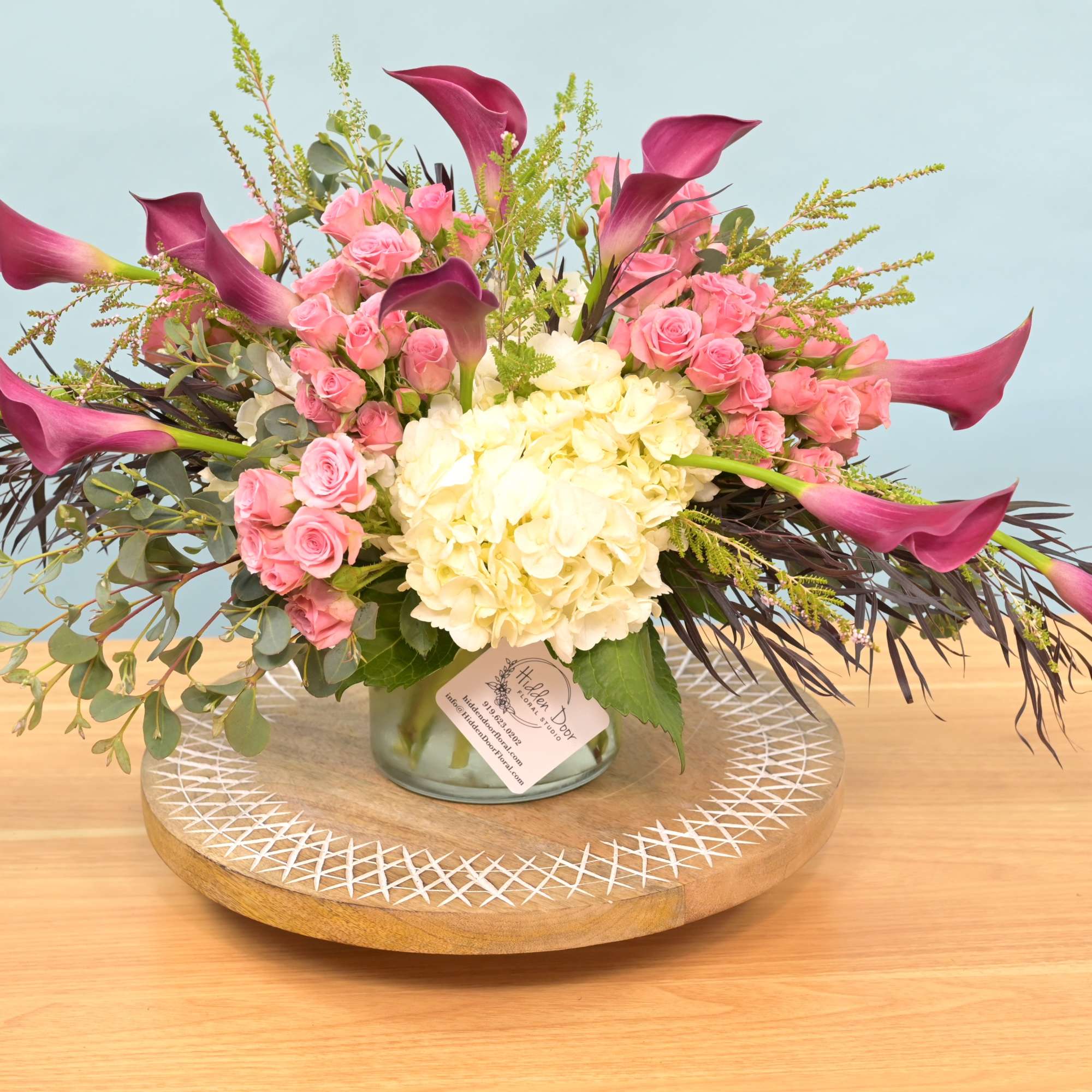 Carpe Diem

Carpe Diem is a sweeping, feminine arrangement built around vivid pink