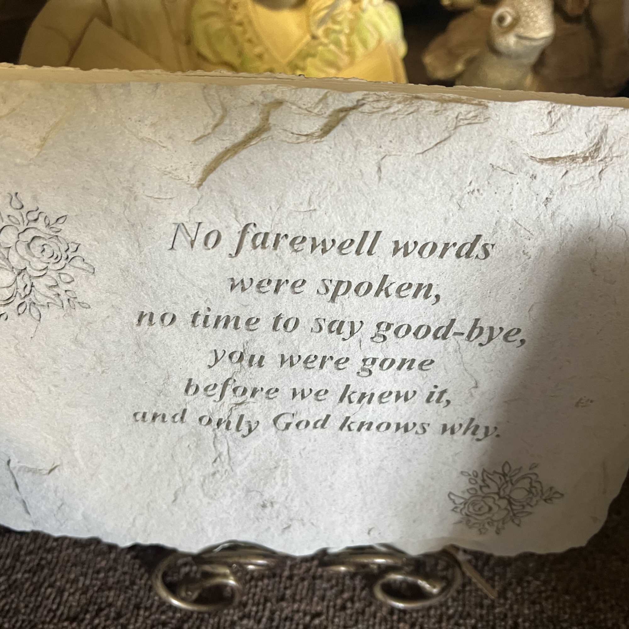 Choice stepping stone with stand and dressed with a bow.