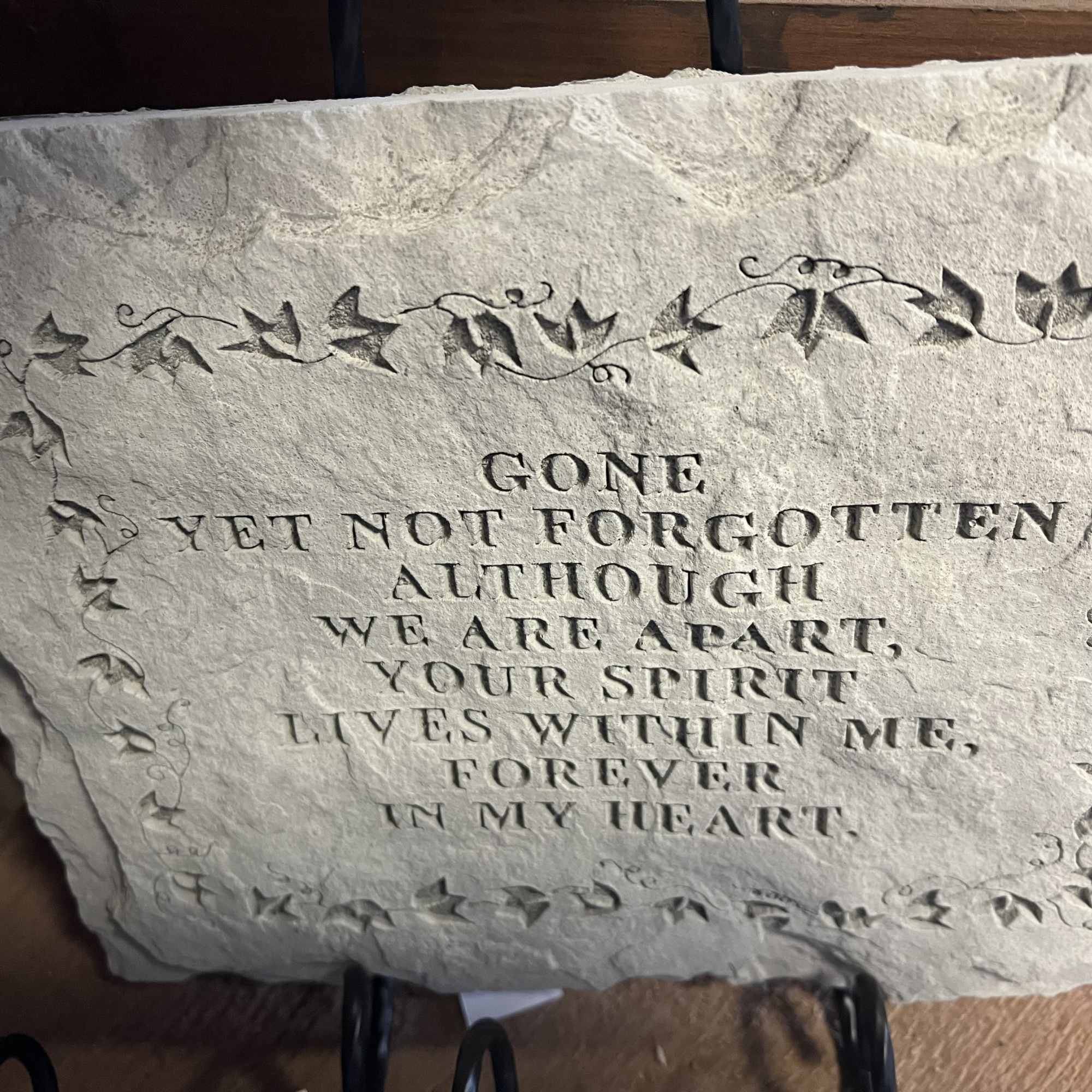 Choice stepping stone with stand and dressed with a bow.